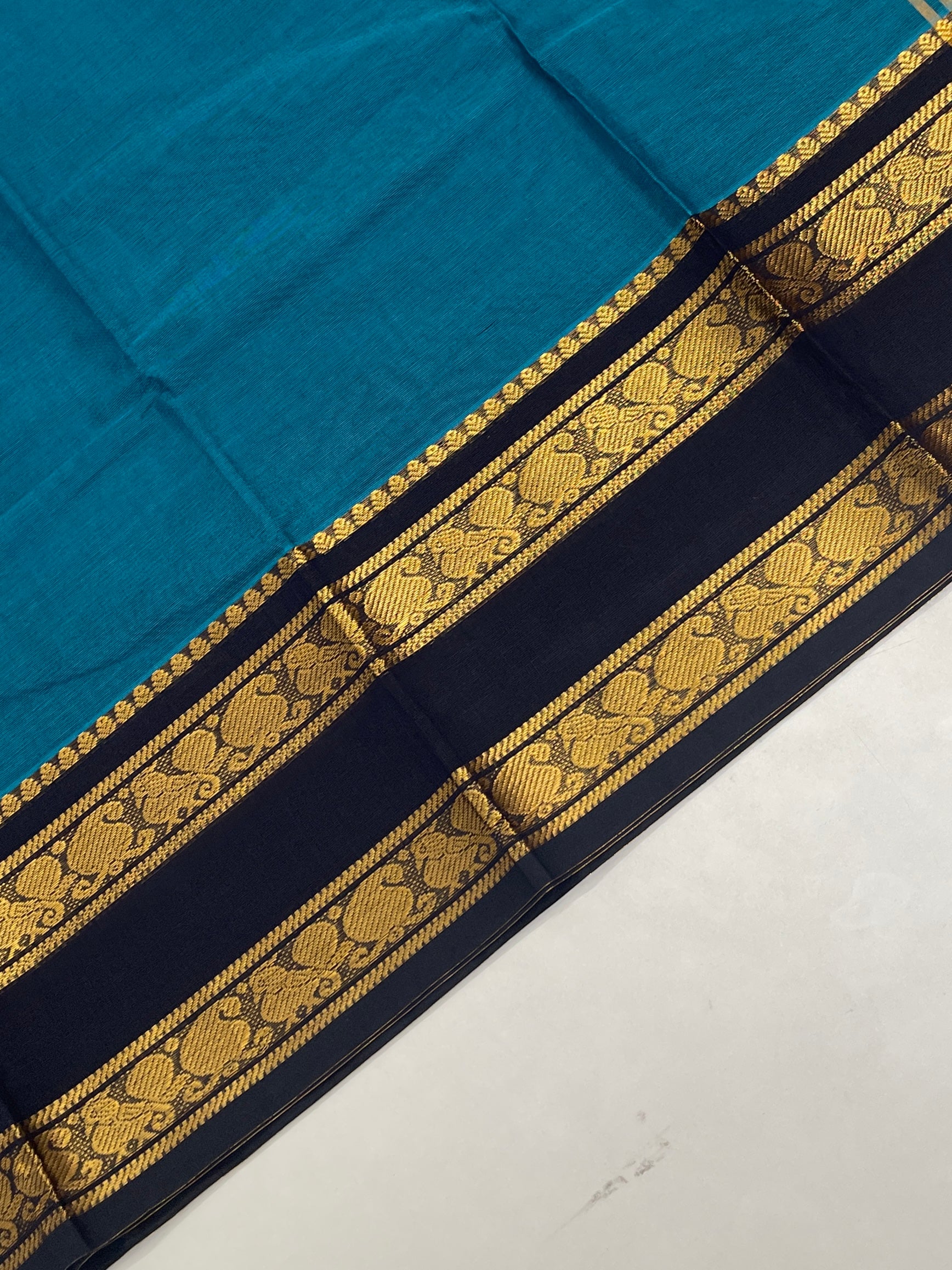 Peacock Blue Kanchi Cotton Saree With Plain Pattern