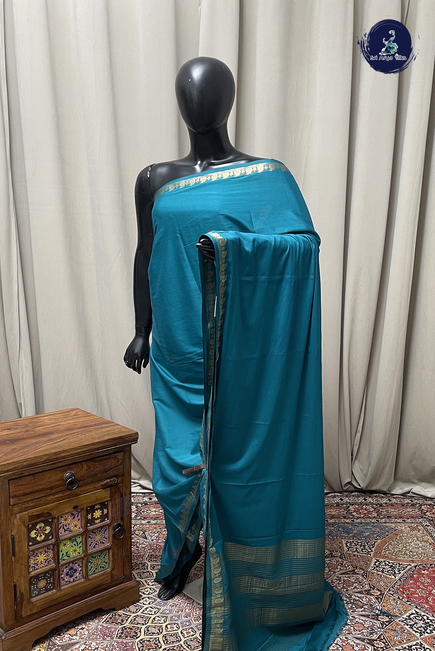 Sapphire Green Semi Mysore Silk With Plain Pattern