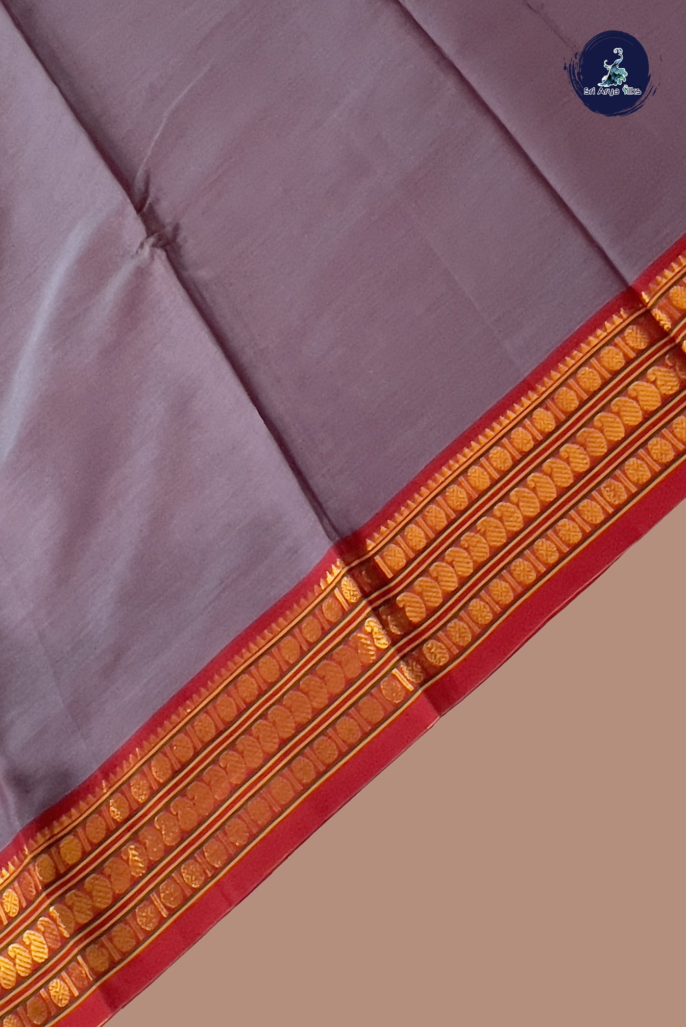 Greyish Purple Budget Semi Silk Cotton Saree With Plain Pattern