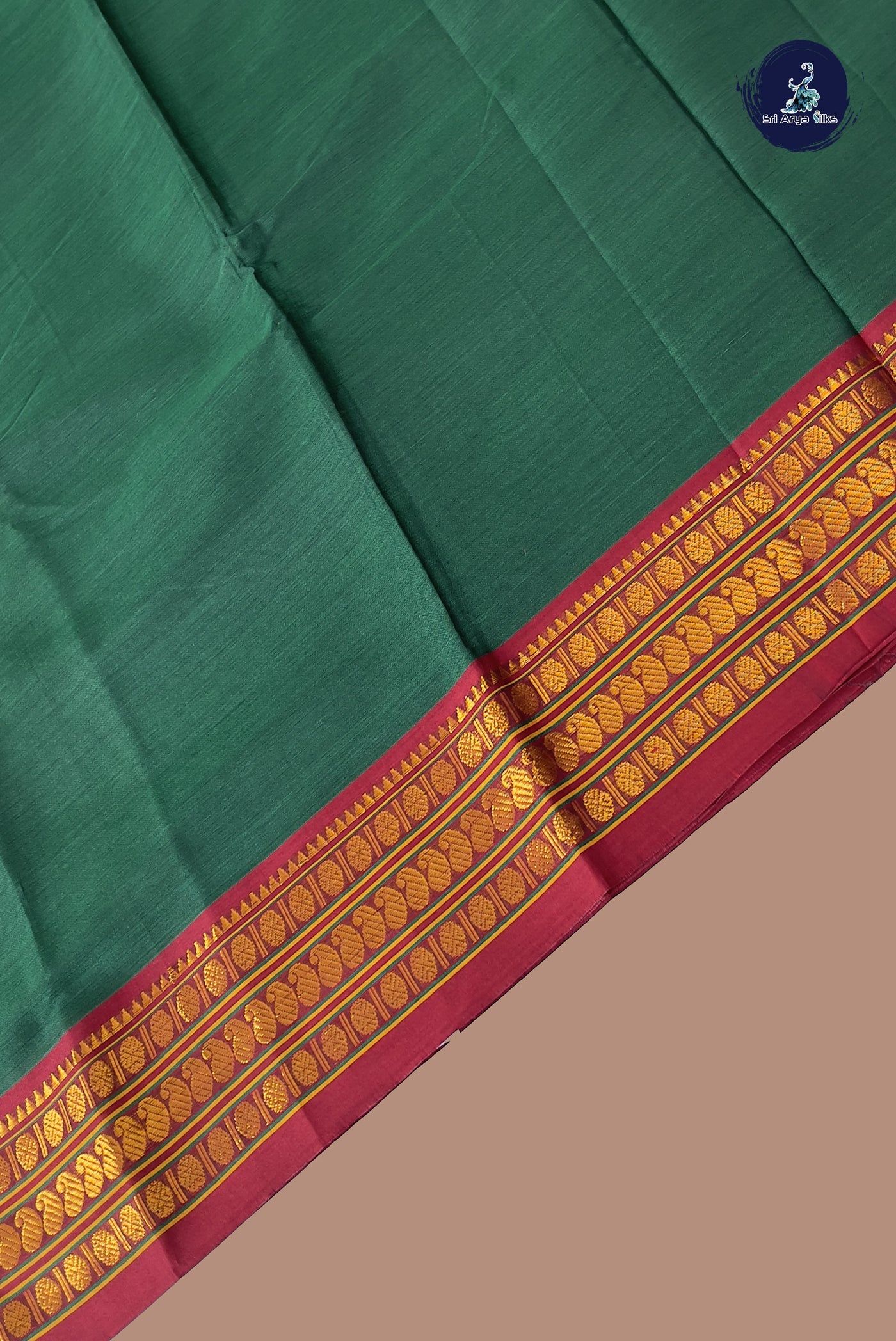 Bottle Green Budget Semi Silk Cotton Saree With Plain Pattern