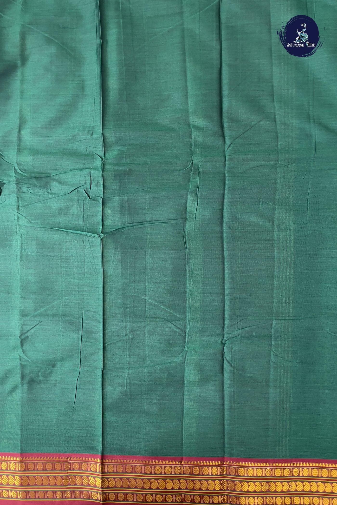 Bottle Green Budget Semi Silk Cotton Saree With Plain Pattern