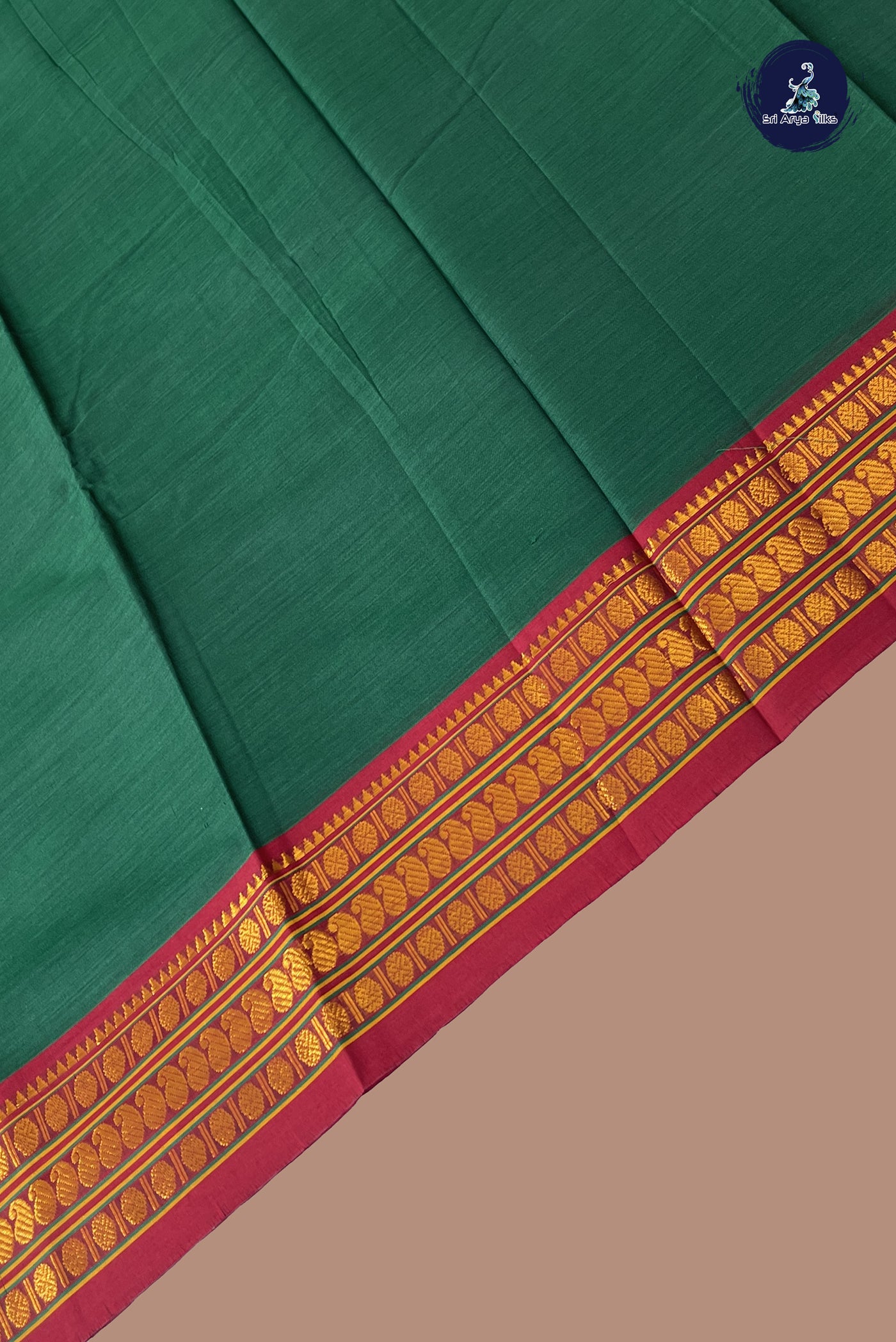 Bottle Green Budget Semi Silk Cotton Saree With Plain Pattern