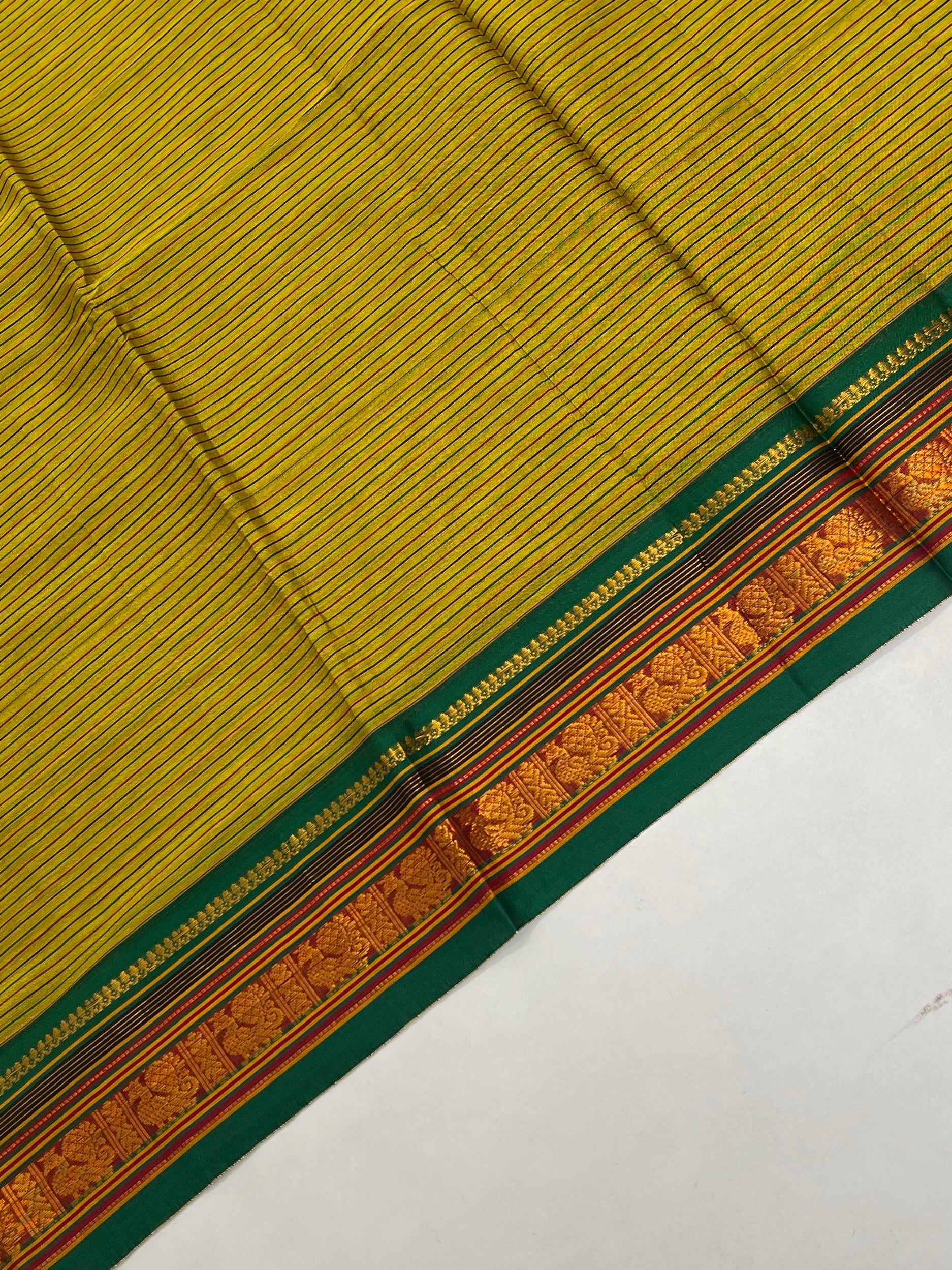 Yellowish Green Budget Semi Silk Cotton Saree With Doria Lines Pattern