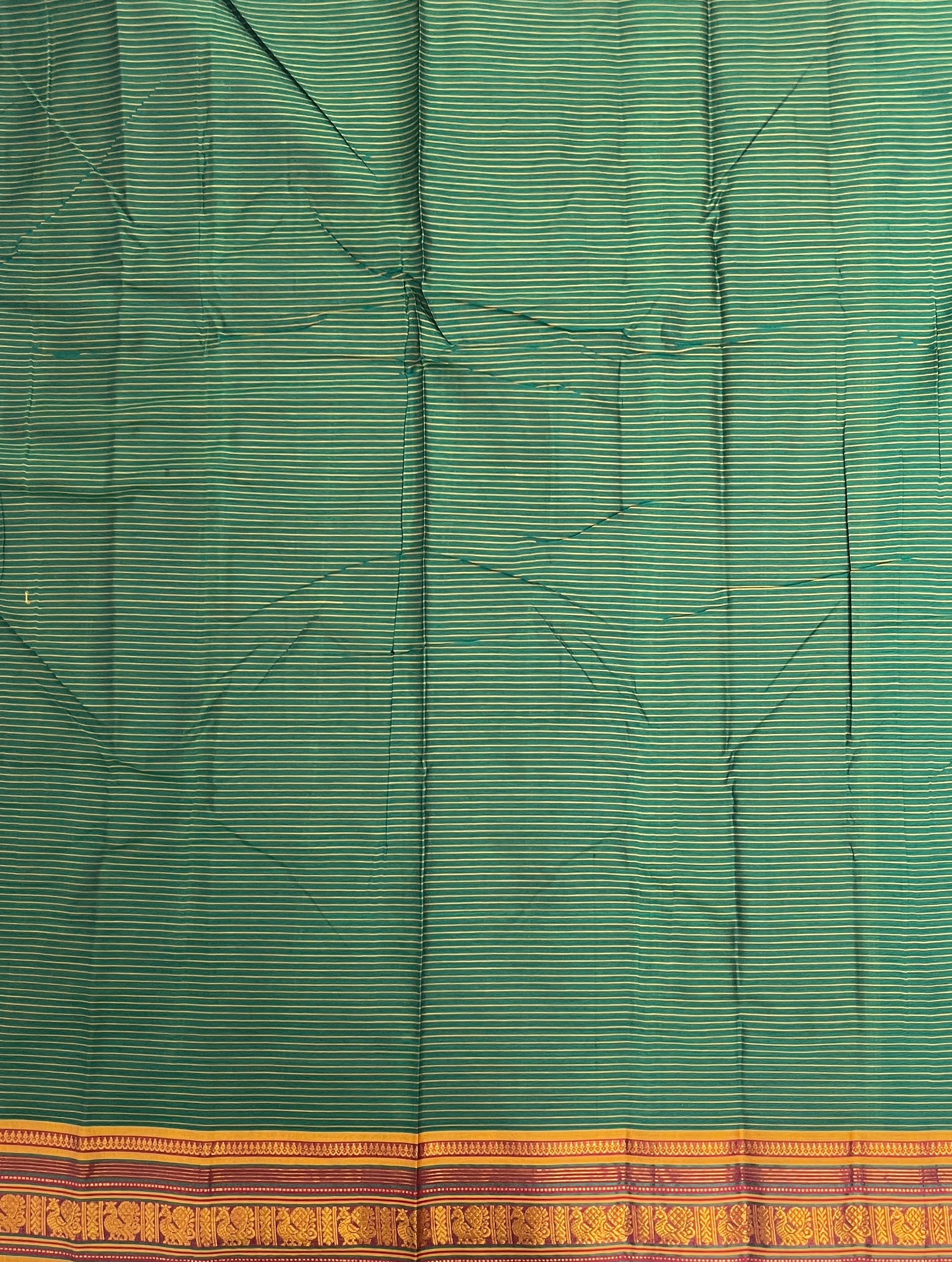 Dark Green Budget Semi Silk Cotton Saree With Doria Lines Pattern