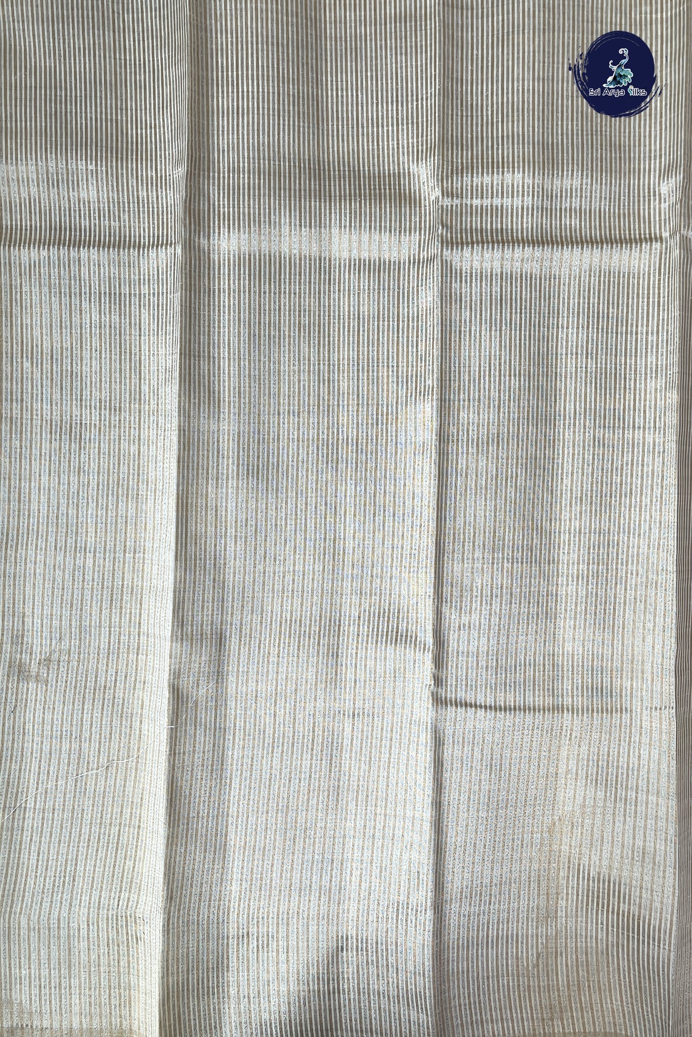 Off White Semi Tussar Saree With Zari Buttas Pattern