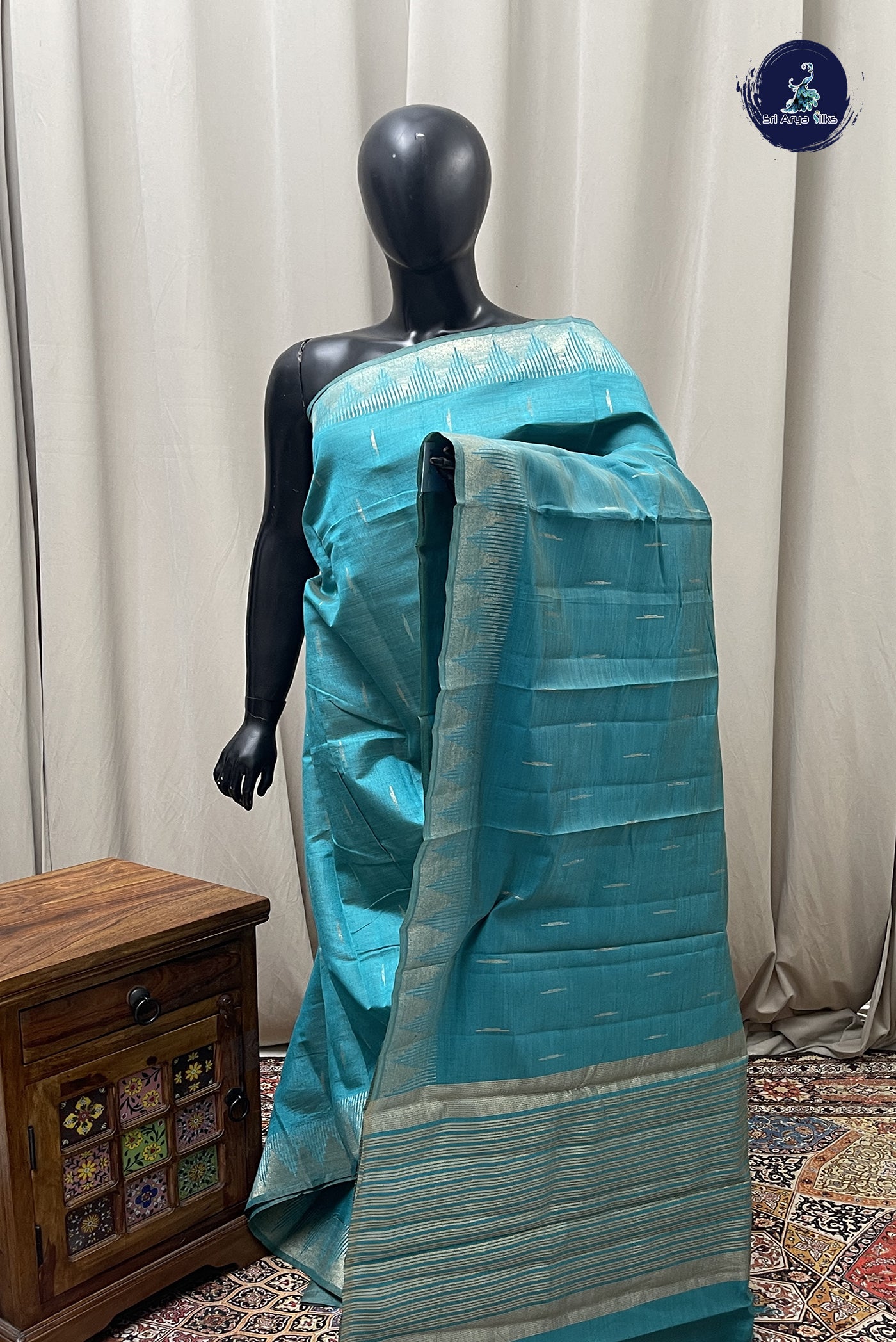 Teal Blue Semi Tussar Saree With Zari Buttas Pattern