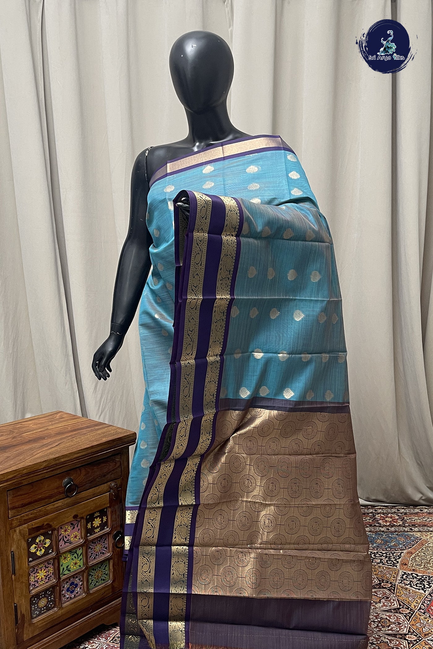 Teal Budget Semi Silk Cotton Saree With Zari Buttas Pattern