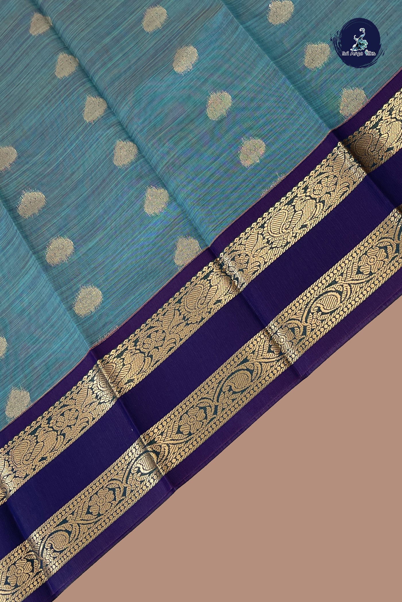Teal Budget Semi Silk Cotton Saree With Zari Buttas Pattern