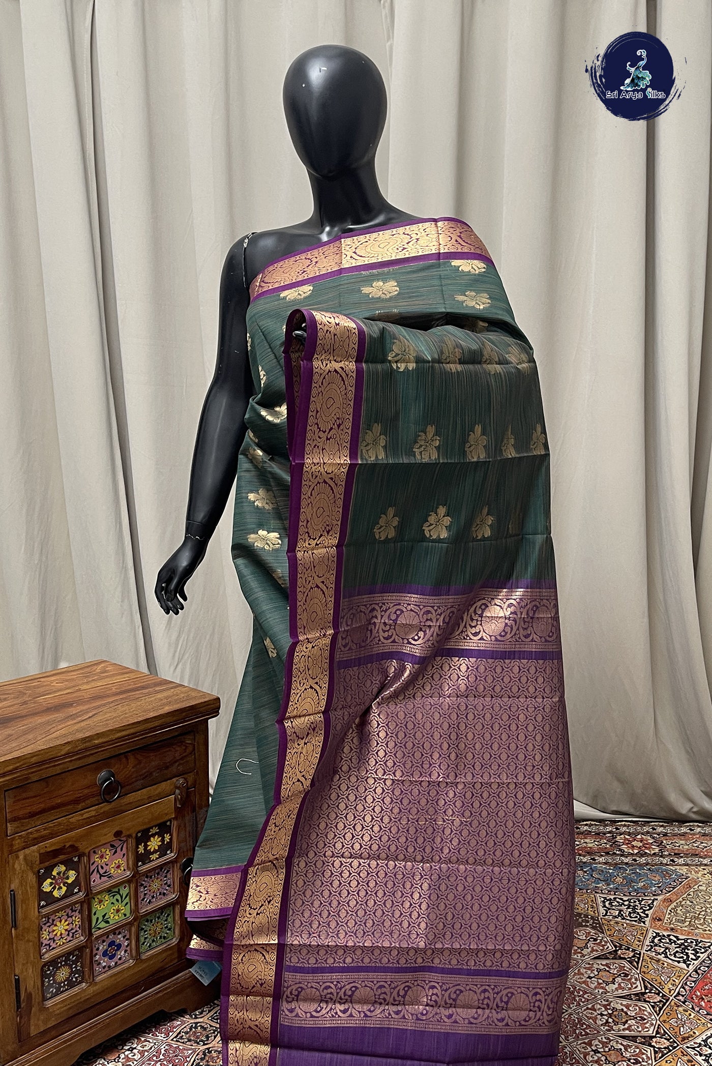 Bottle Green Budget Semi Silk Cotton Saree With Zari Buttas Pattern