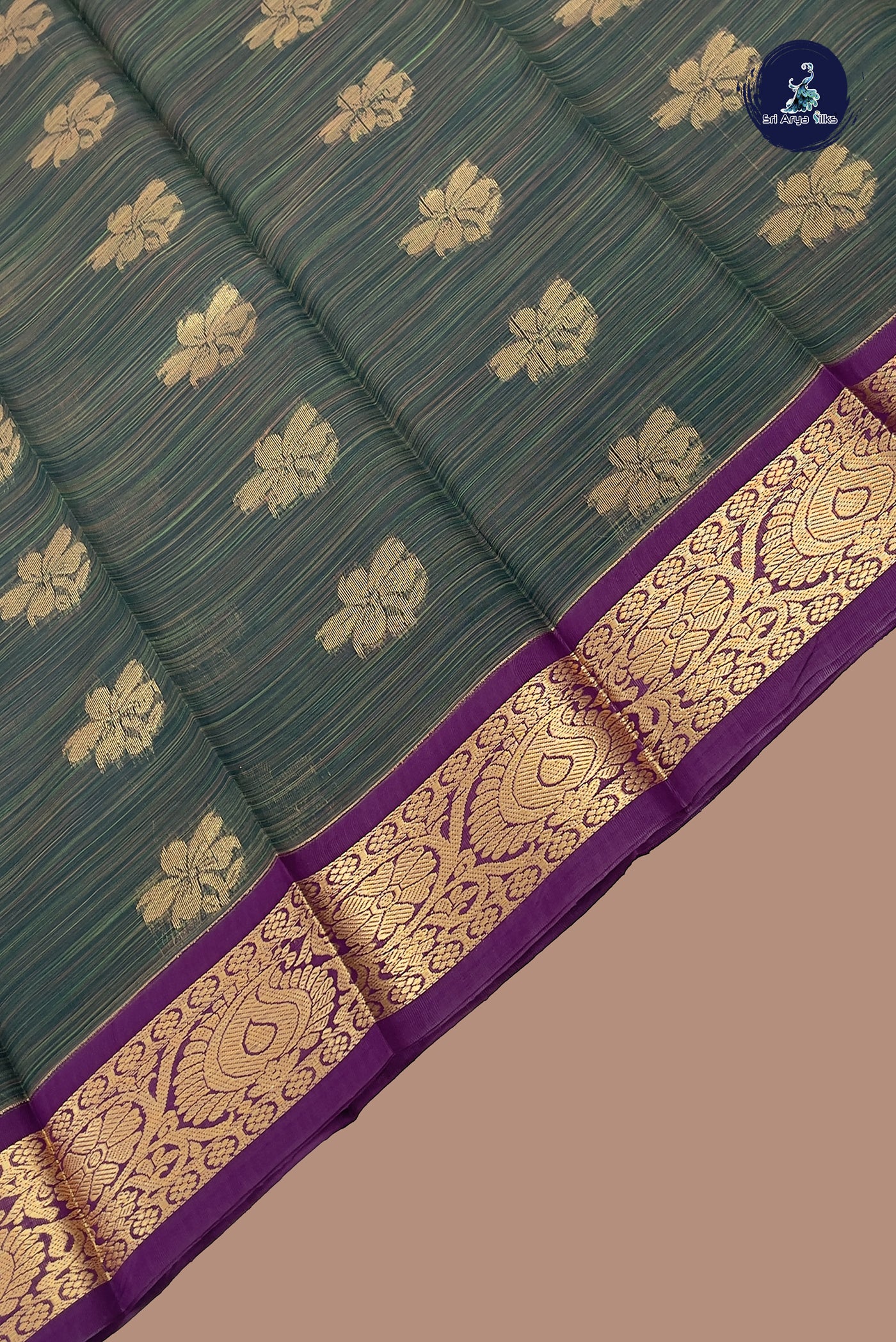 Bottle Green Budget Semi Silk Cotton Saree With Zari Buttas Pattern