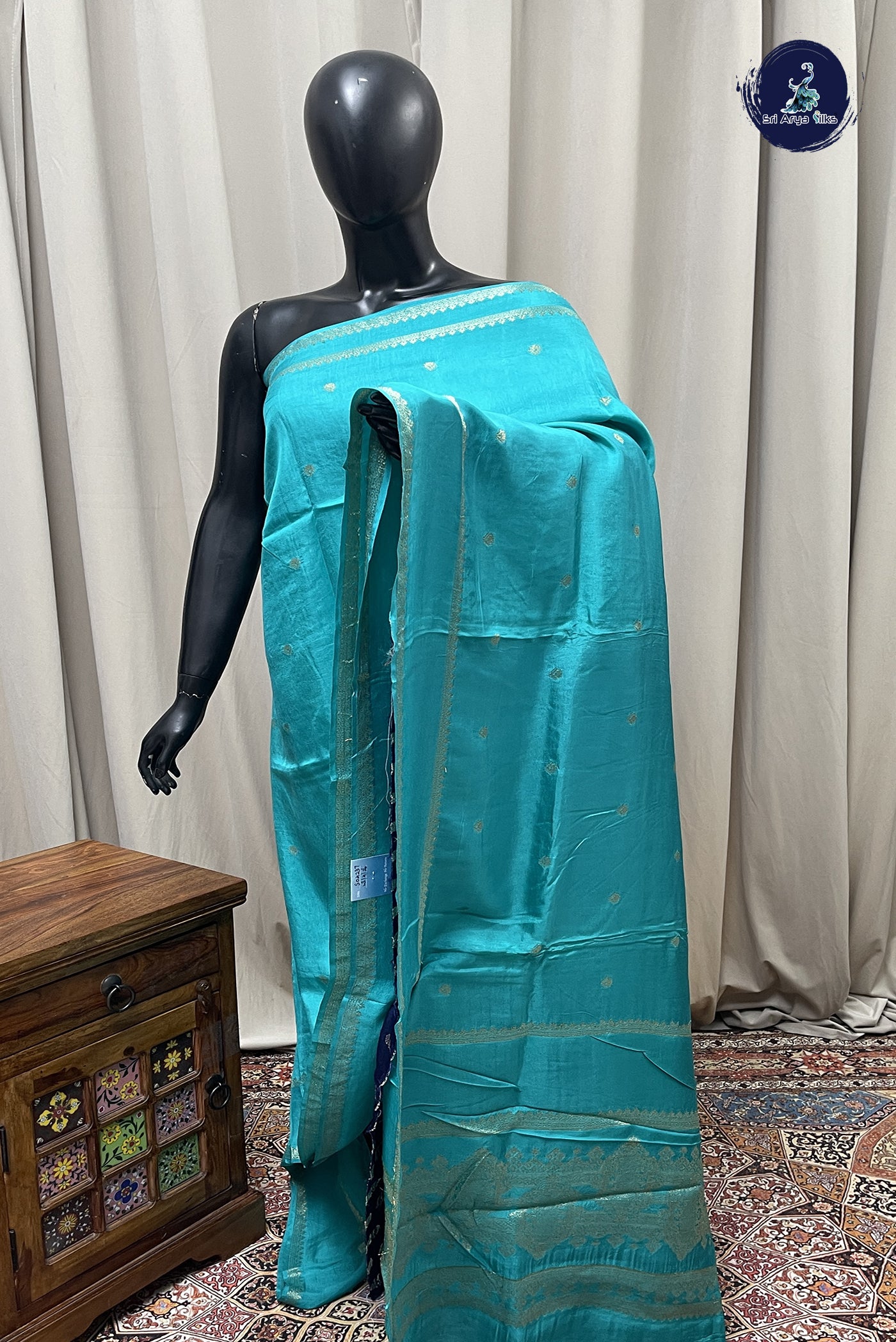 Turquoise Semi Banarasi Saree With Zari Buttas Pattern