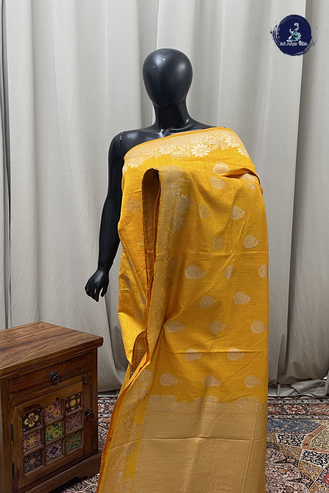 Yellowish Orange Semi Tussar Saree With Zari Buttas Pattern