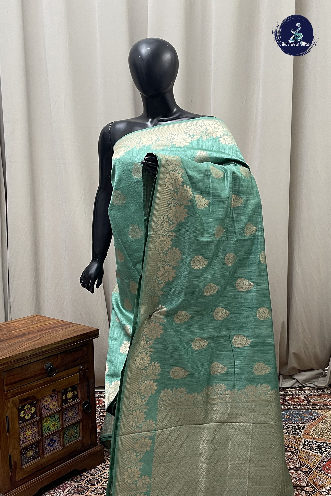 Pastel Green Semi Tussar Saree With Zari Buttas Pattern