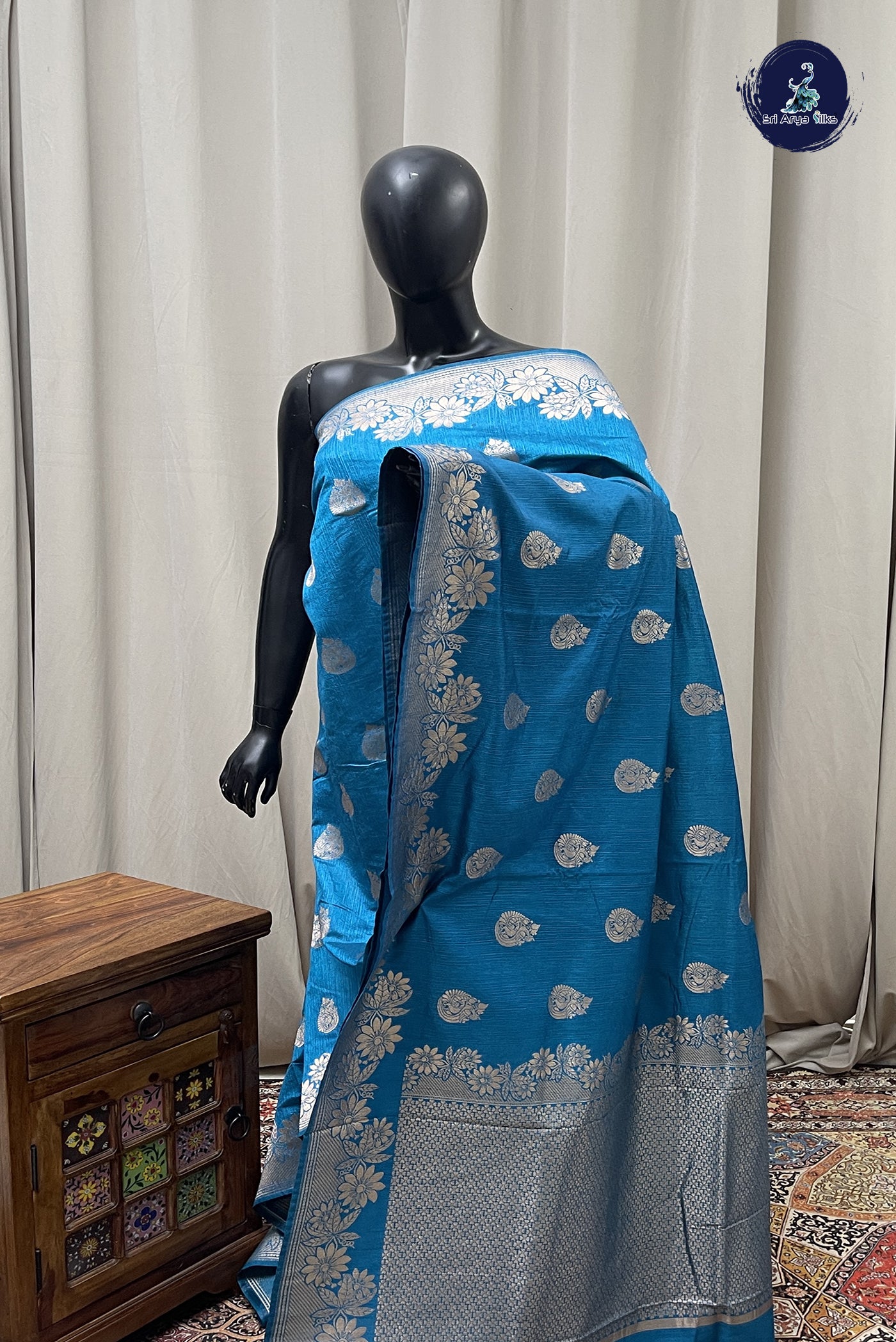 Peacock Blue Semi Tussar Saree With Zari Buttas Pattern