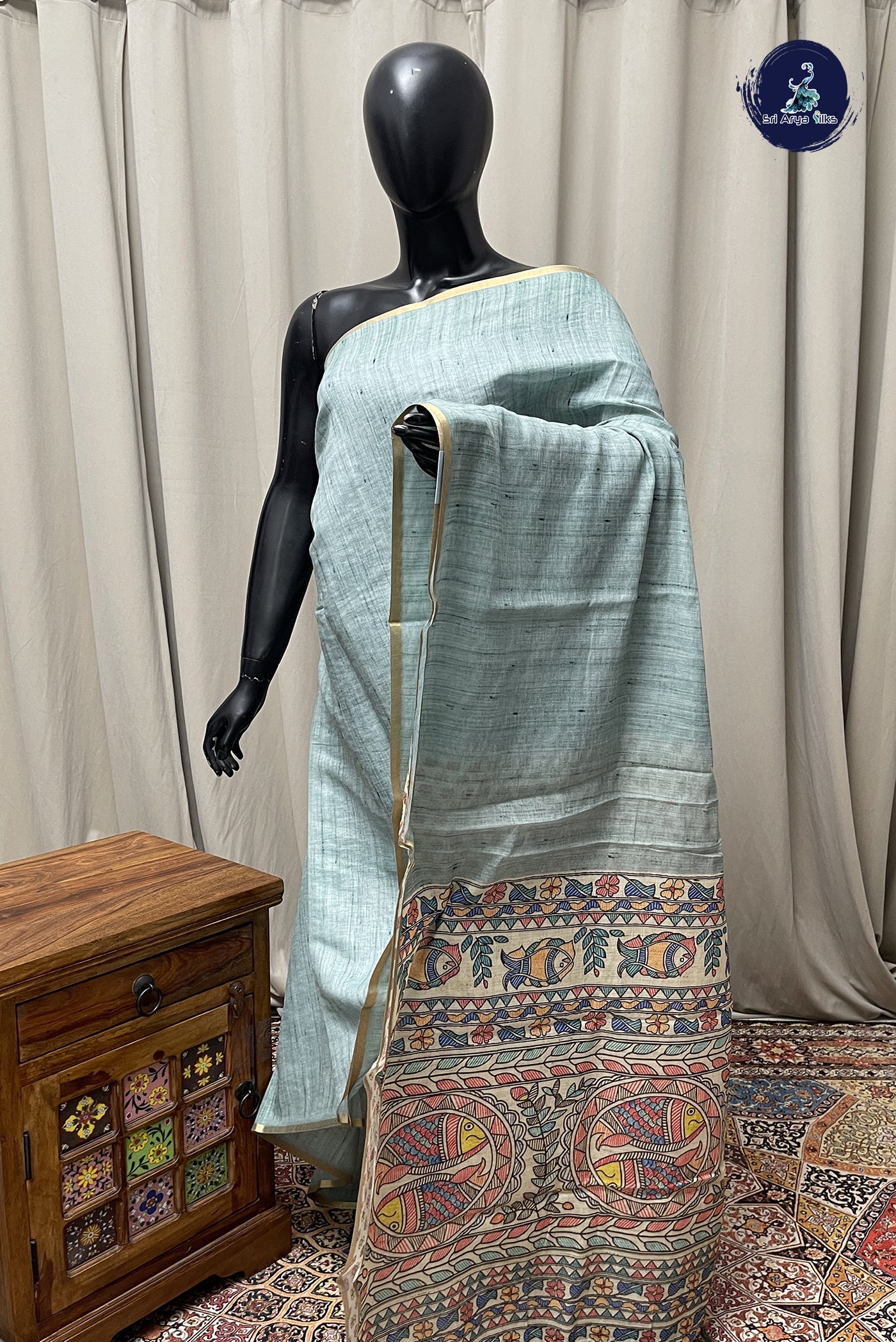 Pastel Green Linen Saree With Plain Pattern