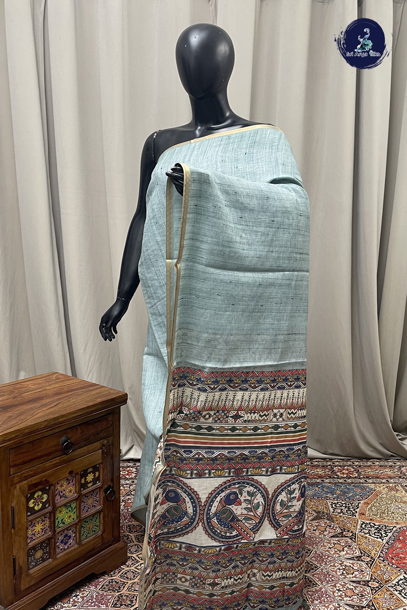 Pastel Green Linen Saree With Plain Pattern