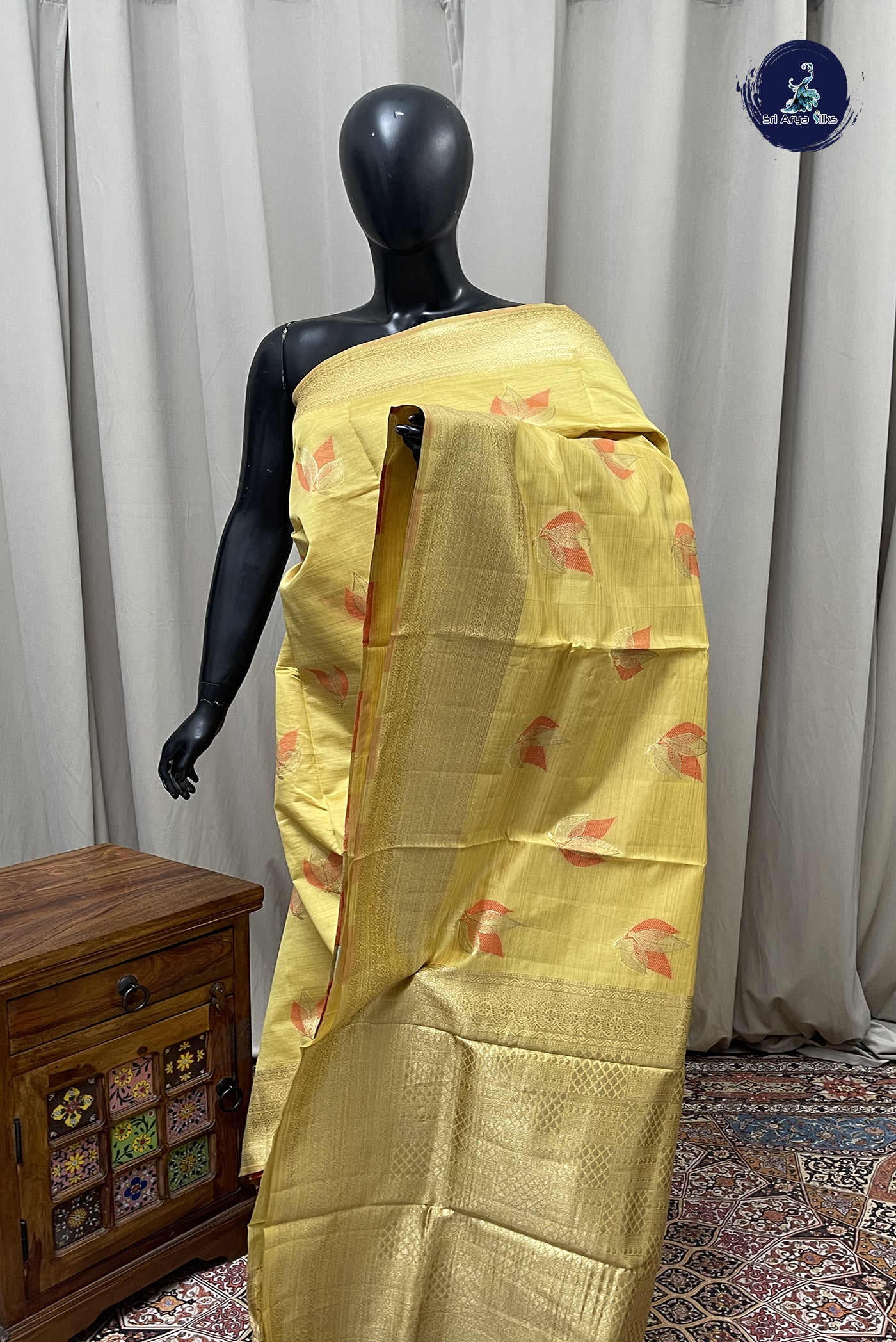 Creamish Yellow Semi Tussar Saree With Buttas Pattern