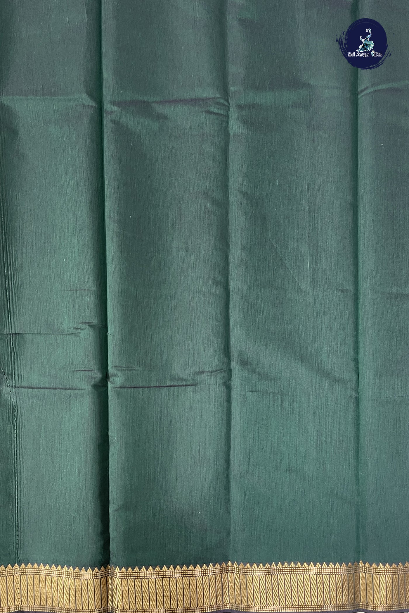 Bottle Green Budget Semi Silk Cotton Saree With Plain Pattern