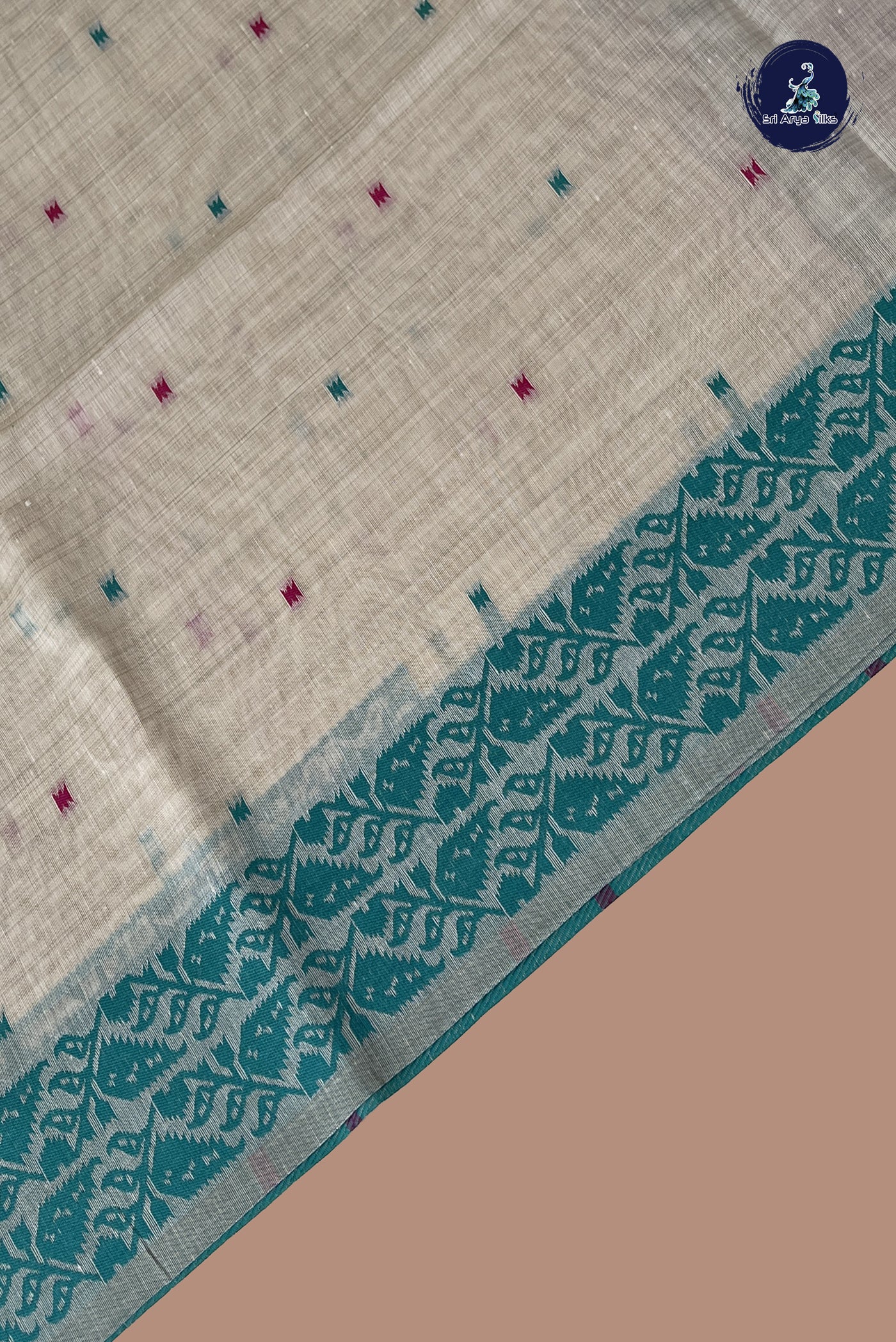 Ivory Cotton Saree With Buttas Pattern
