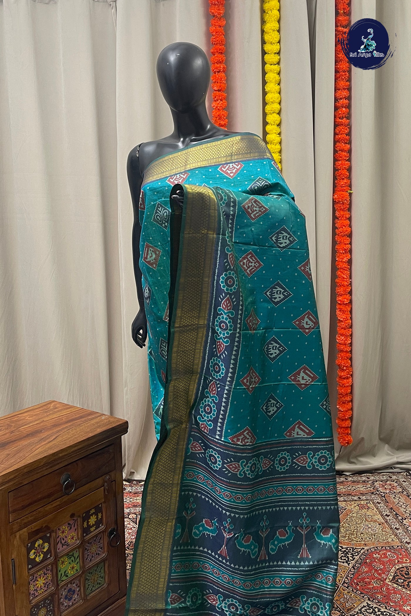 Teal Semi Pattola Saree With Ikat Pattern