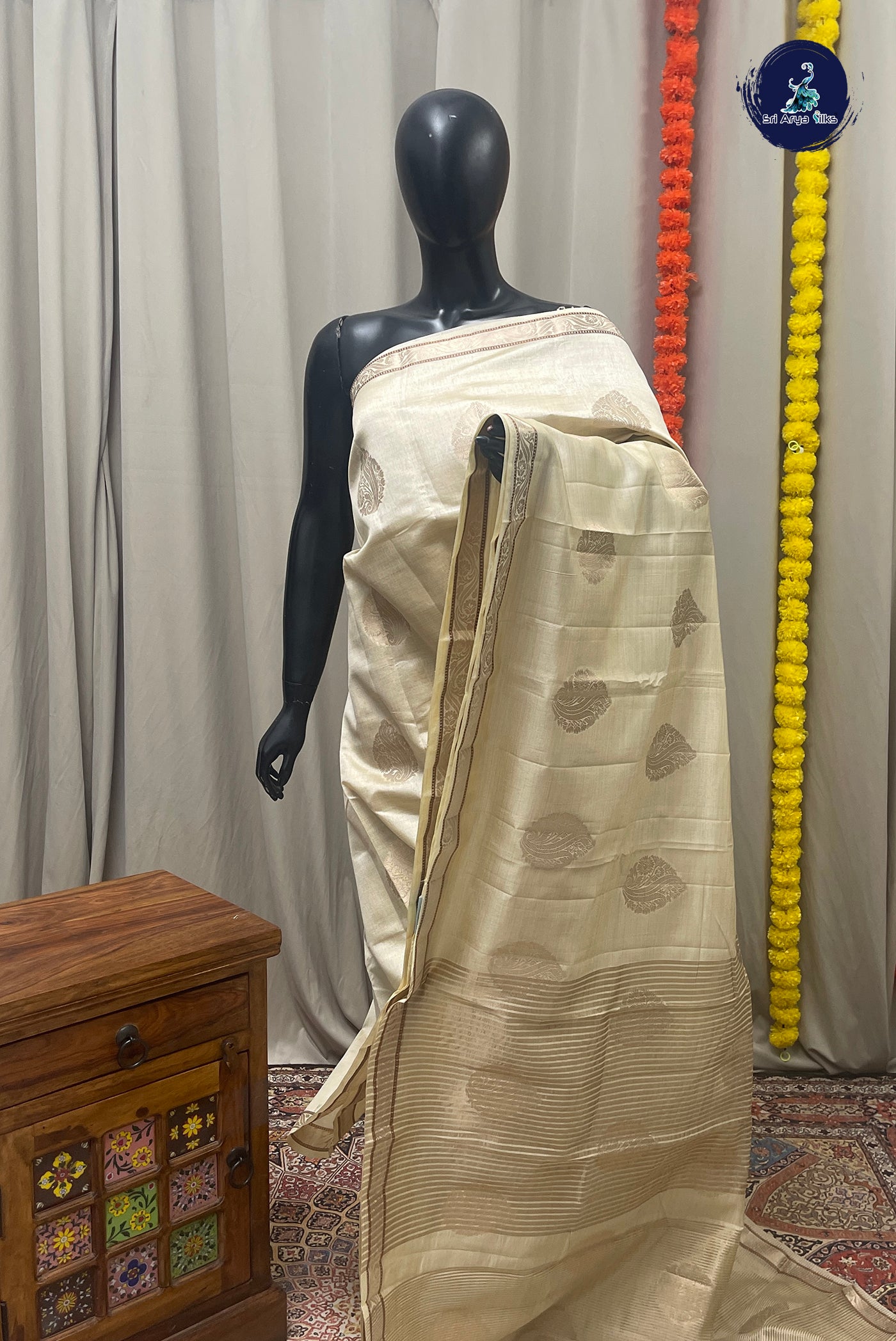 Off White Semi Tussar Saree With Zari Buttas Pattern