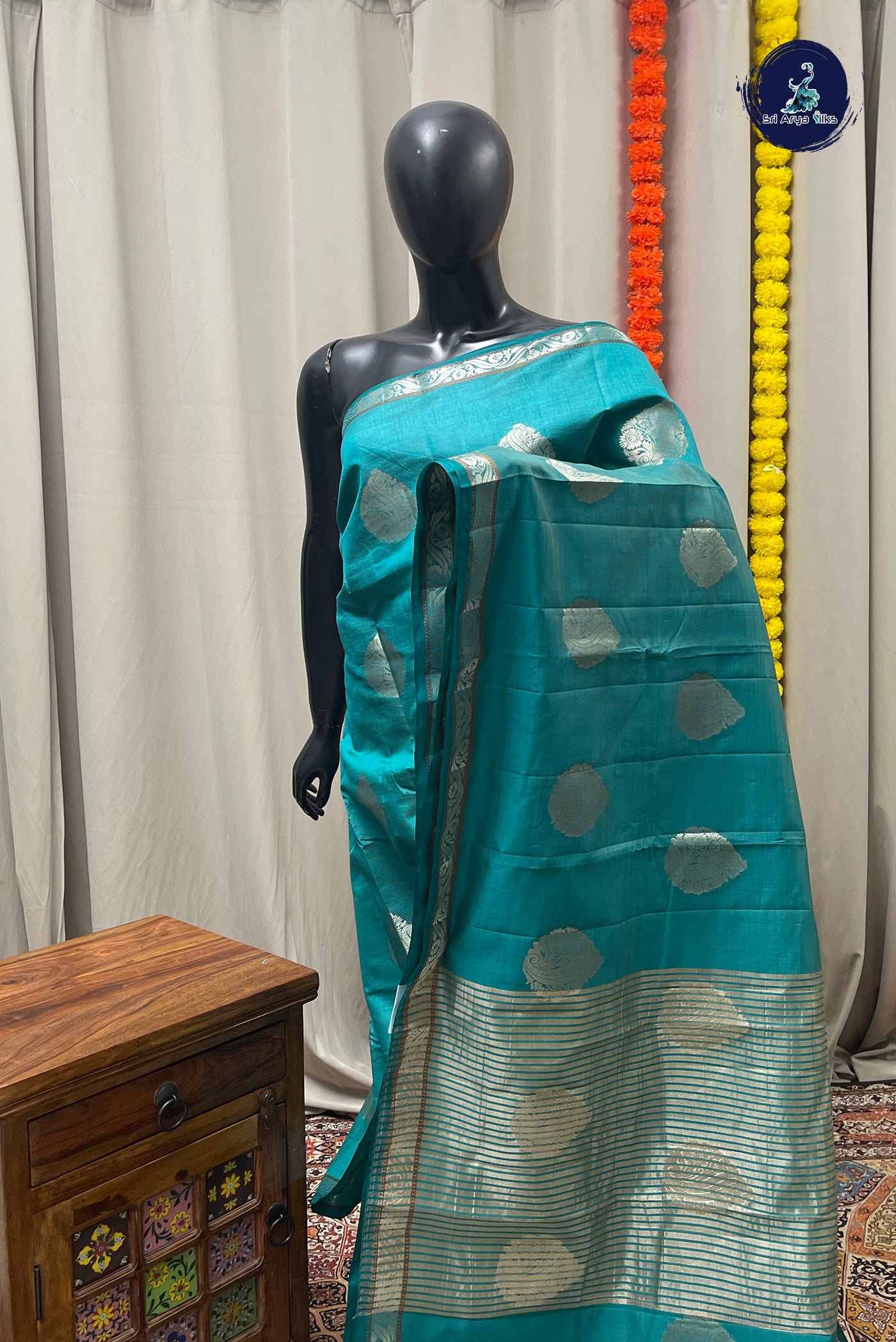 Teal Semi Tussar Saree With Zari Buttas Pattern