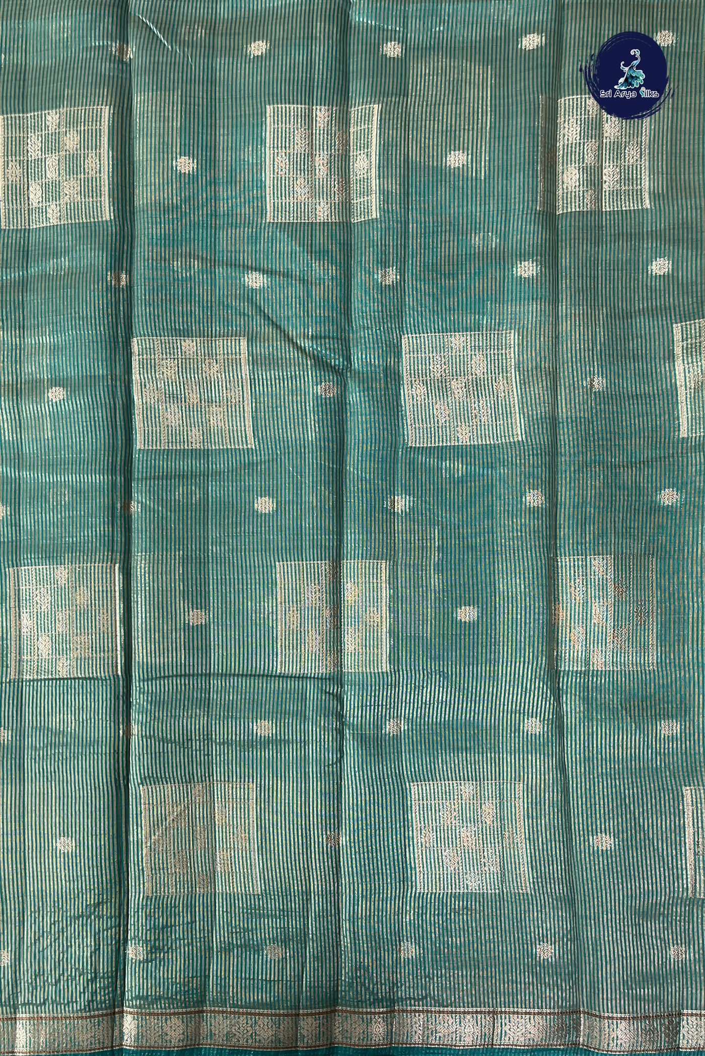 Teal Semi Tussar Saree With Zari Buttas Pattern