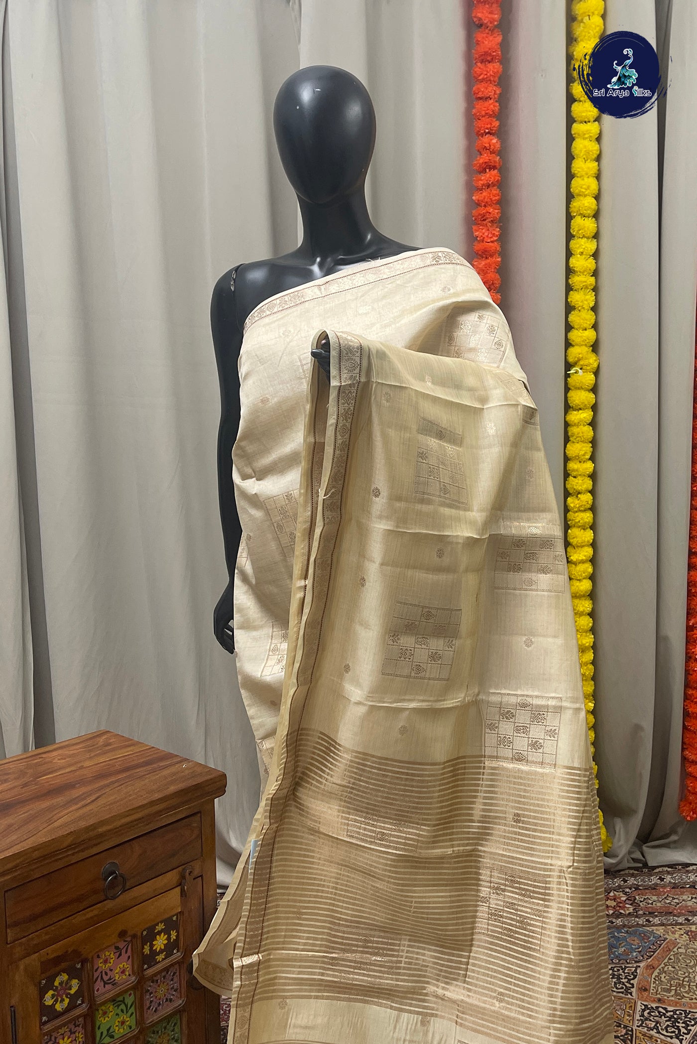 Off White Semi Tussar Saree With Zari Buttas Pattern