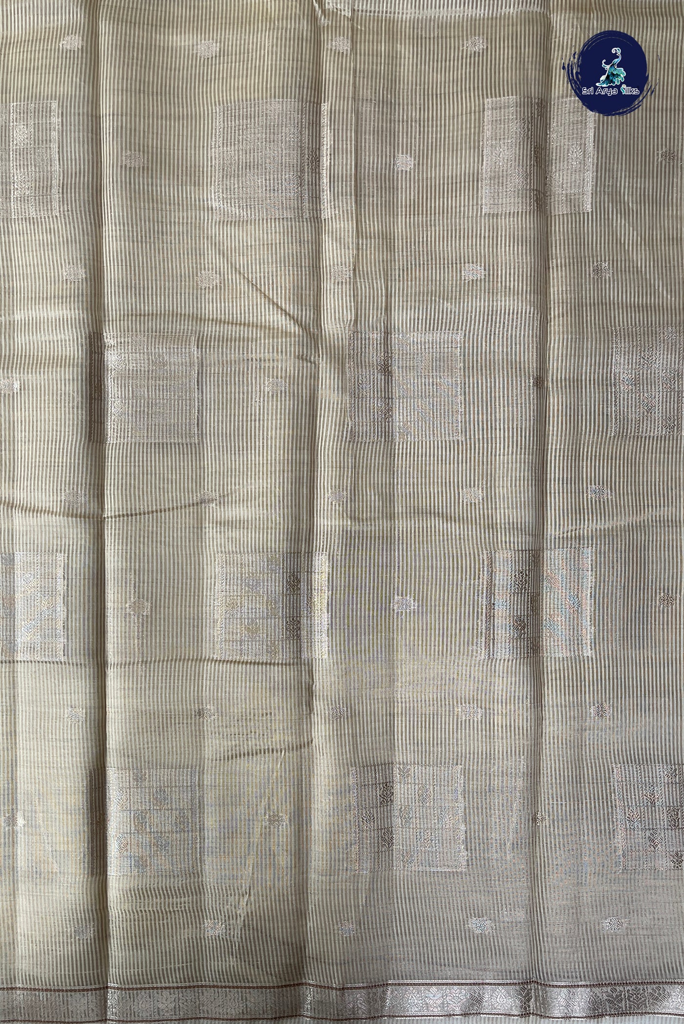 Off White Semi Tussar Saree With Zari Buttas Pattern