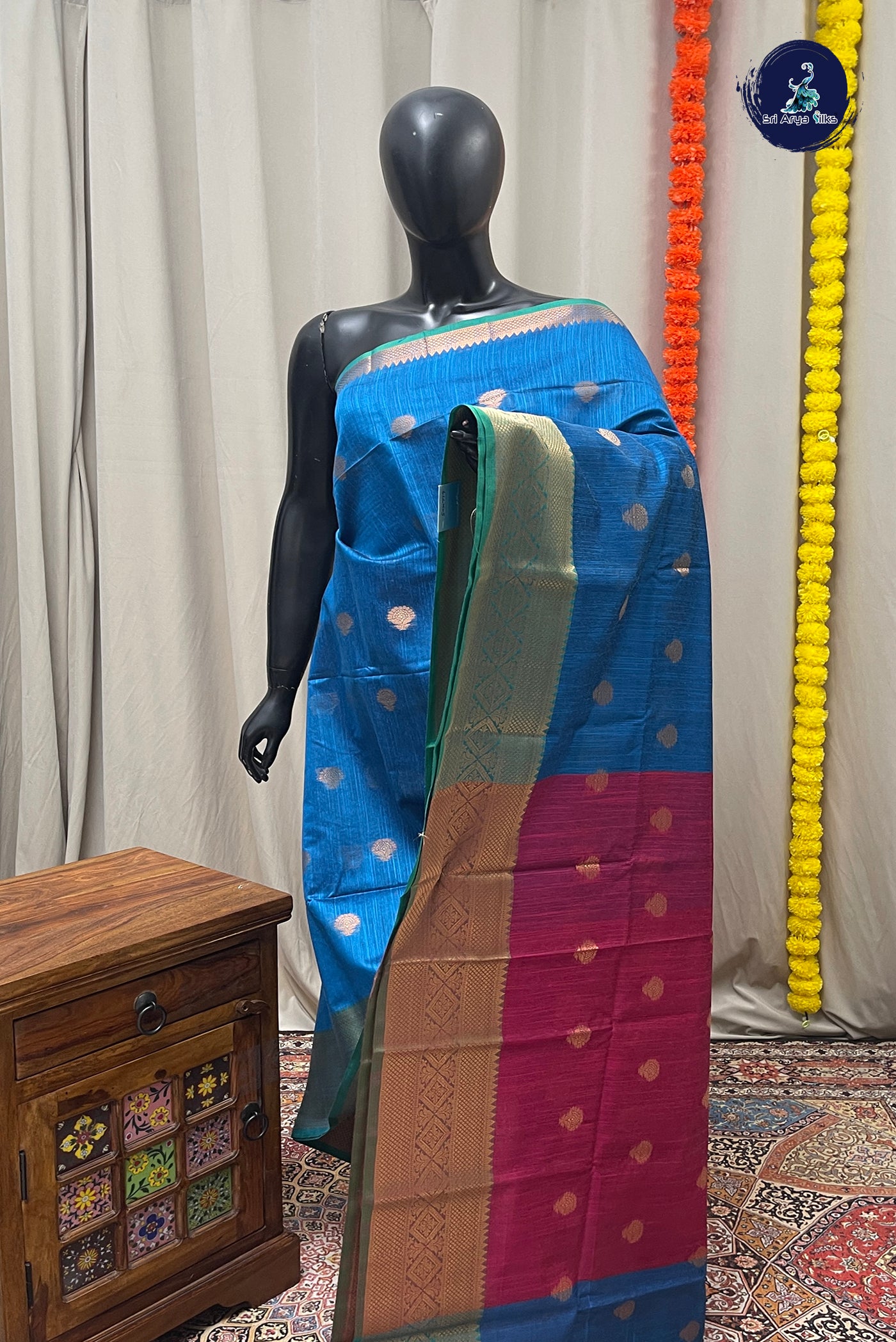 Blue Raw Silk Saree With Zari Buttas Pattern