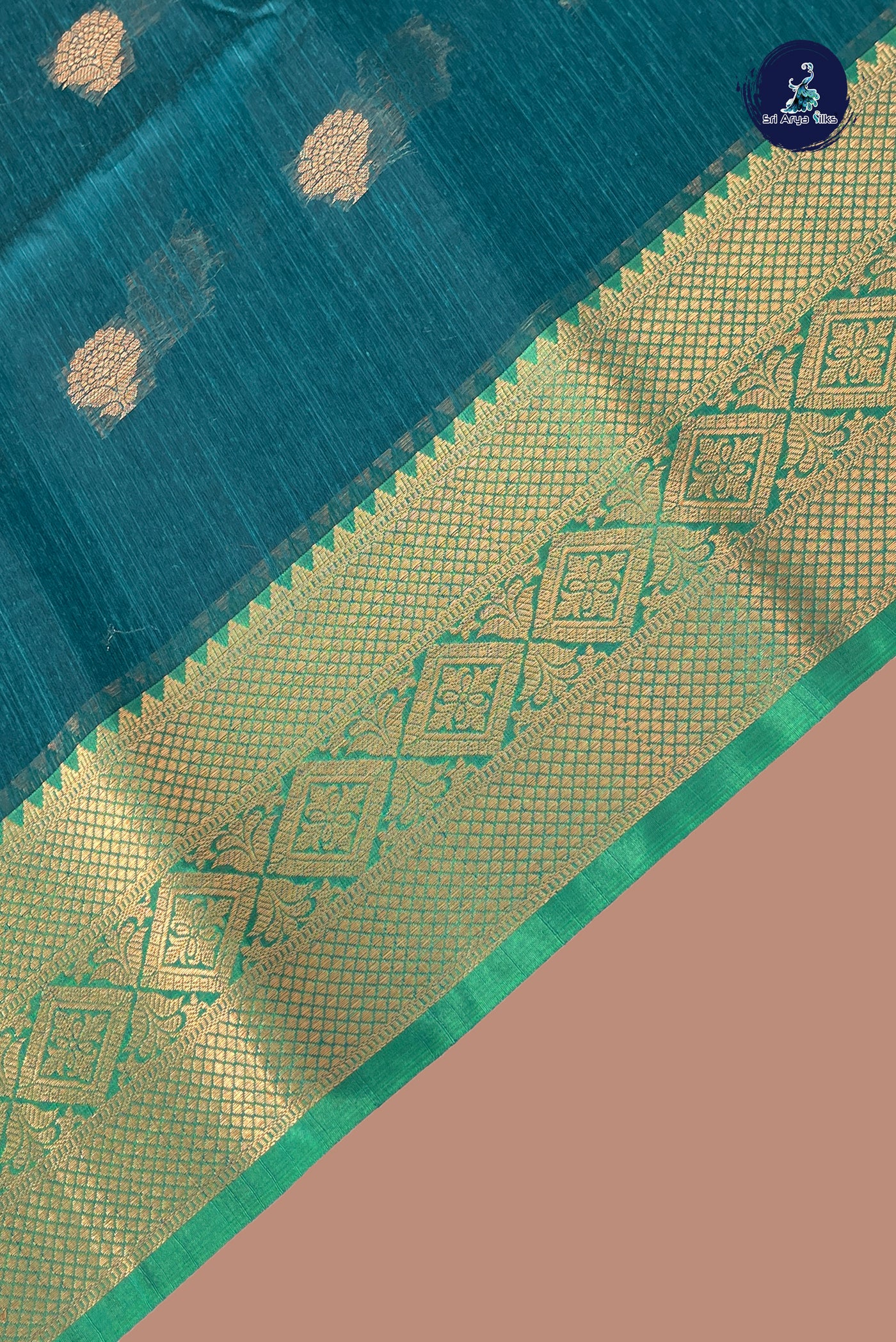Peacock Blue Raw Silk Saree With Zari Buttas Pattern