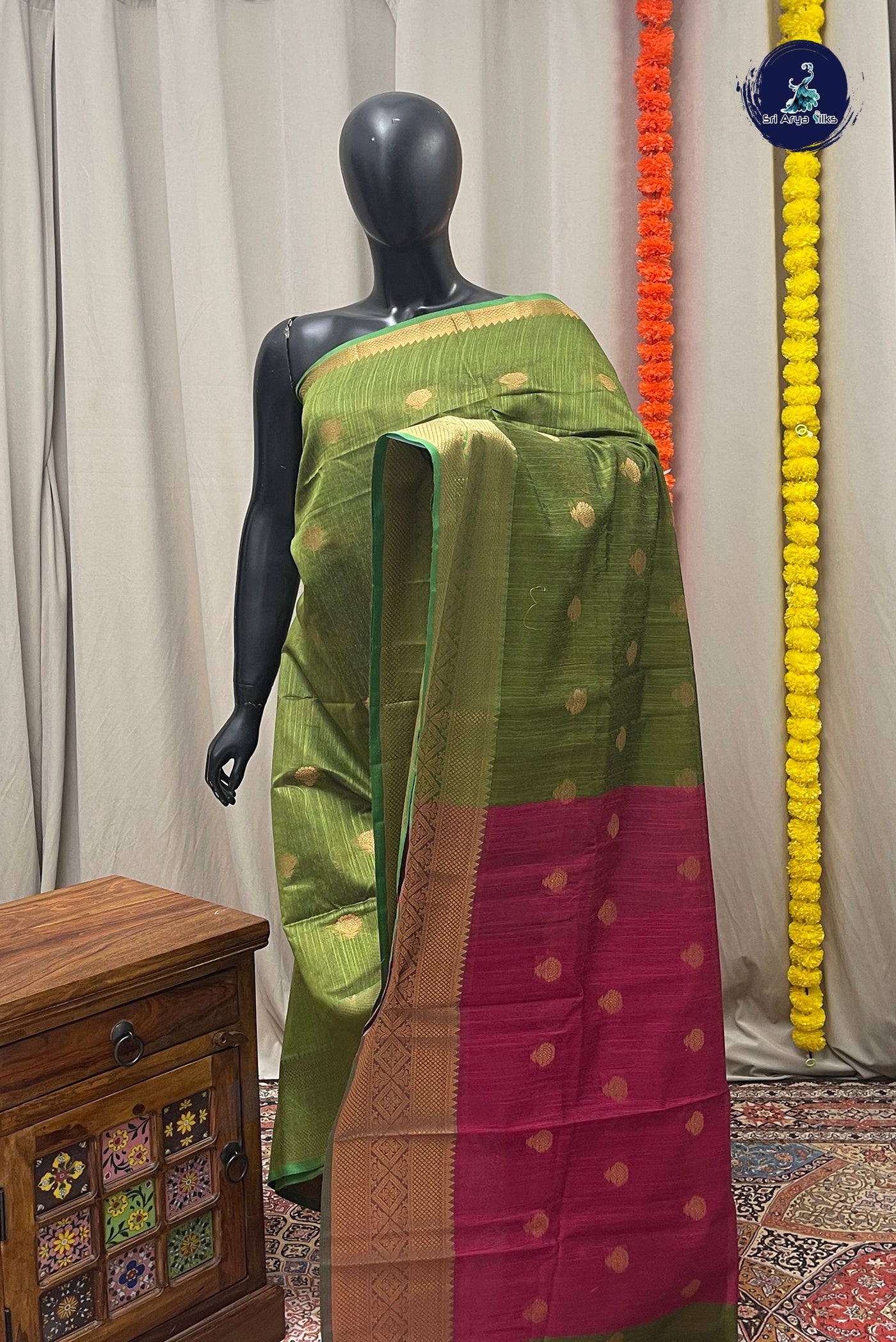 Olive Green Raw Silk Saree With Zari Buttas Pattern