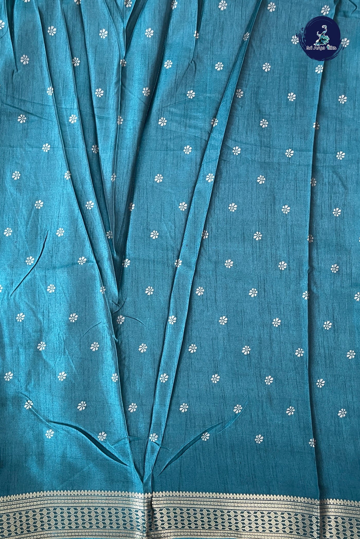 Peacock Green Semi Crepe Silk Saree With Printed Pattern