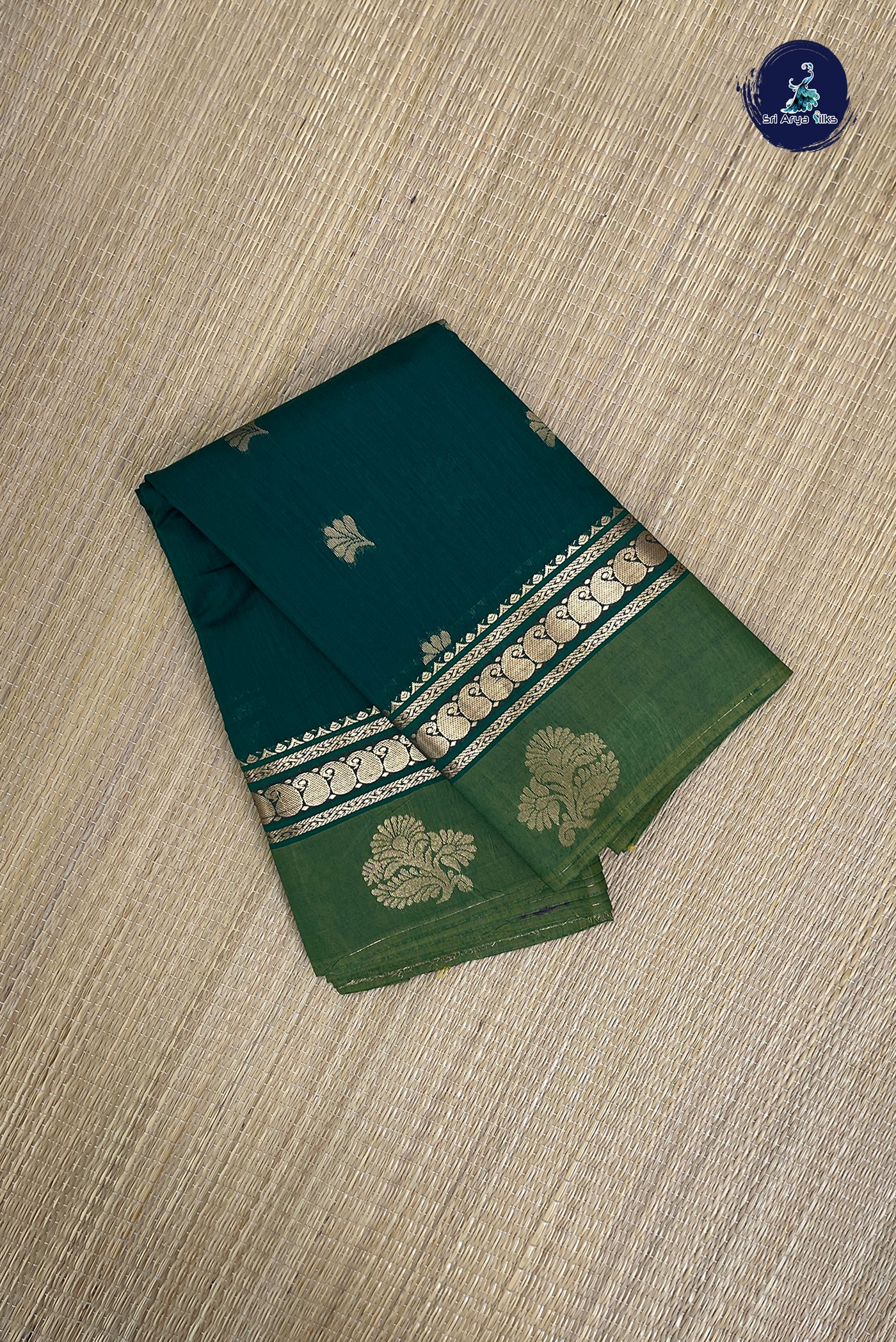 Bottle Green Budget Semi Silk Cotton Saree With Zari Buttas Pattern