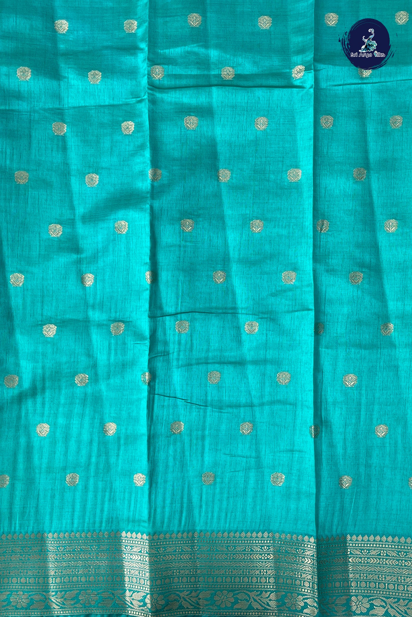 Teal Semi Tussar Saree With Zari Buttas Pattern