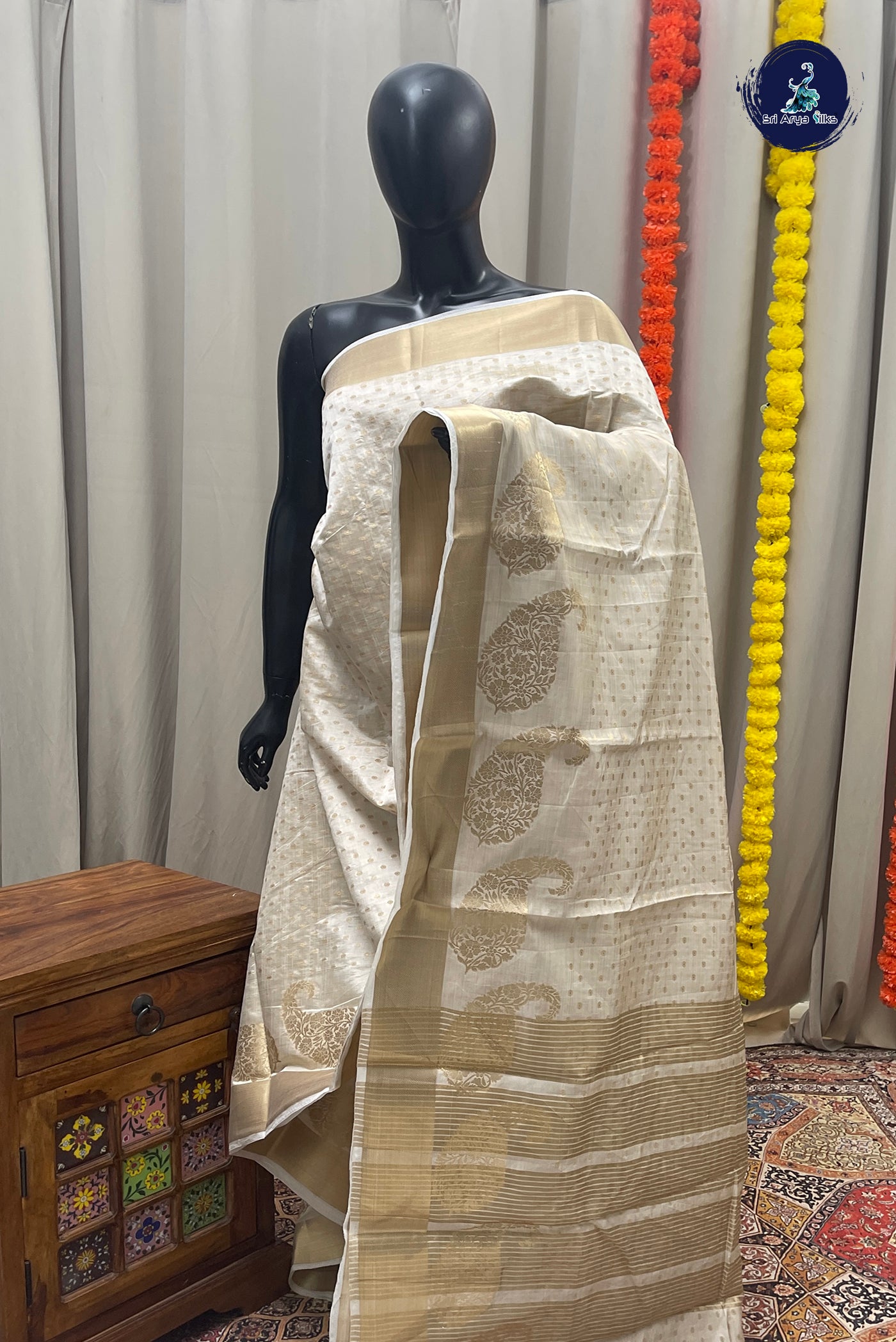 Off White Semi Tussar Saree With Zari Buttas Pattern