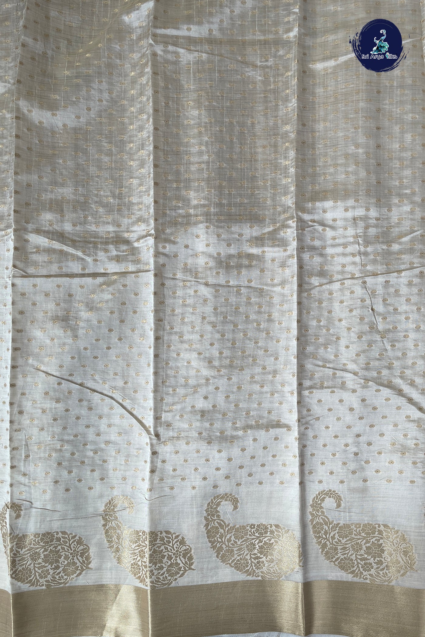 Off White Semi Tussar Saree With Zari Buttas Pattern