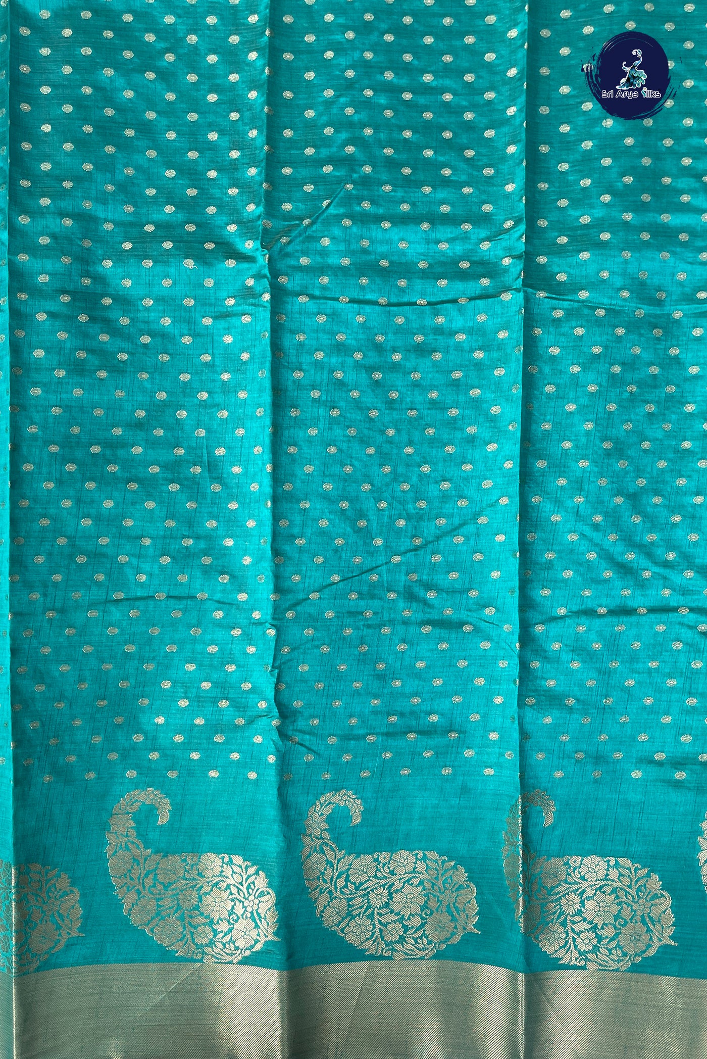 Teal Semi Tussar Saree With Zari Buttas Pattern