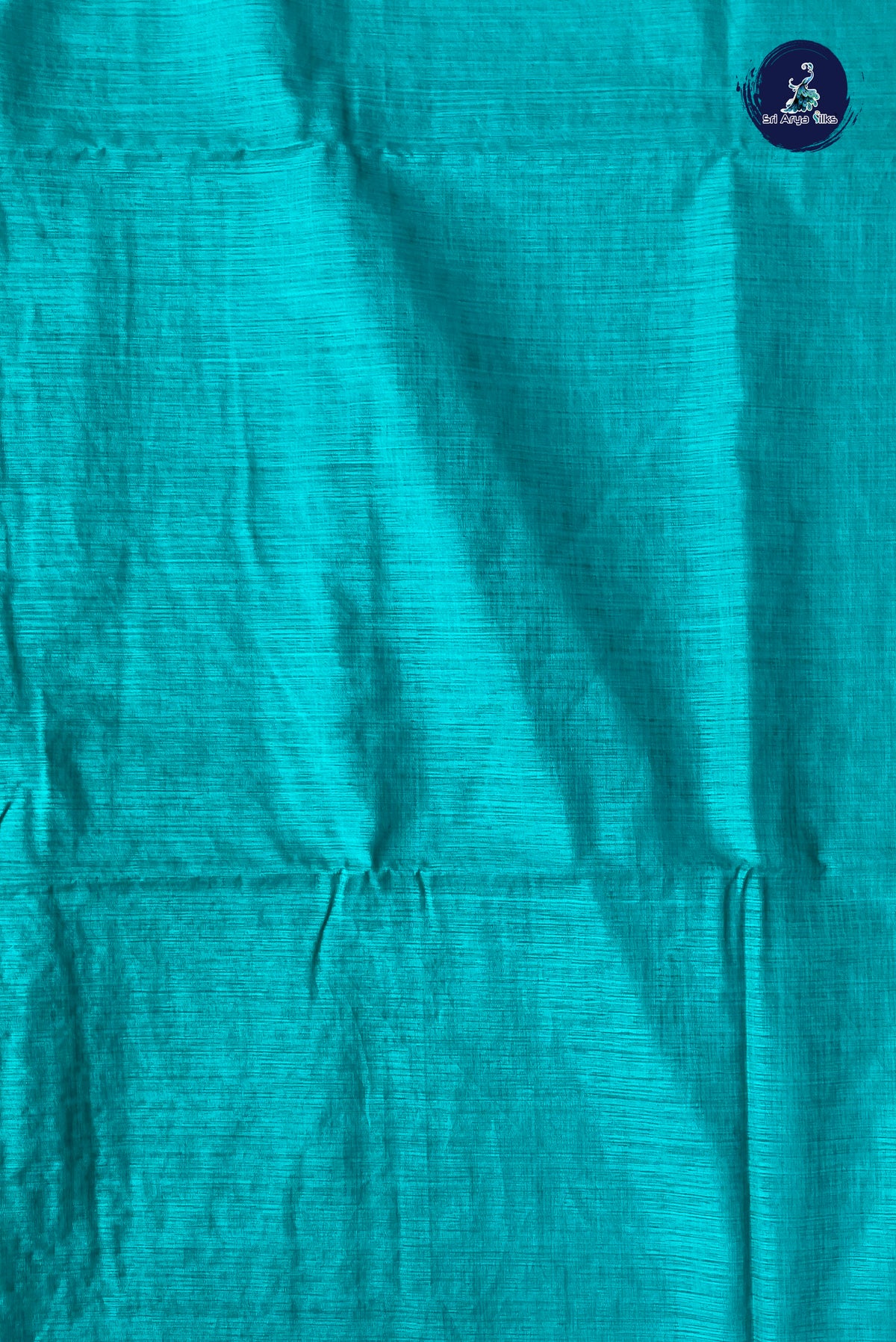 Teal Semi Tussar Saree With Zari Buttas Pattern