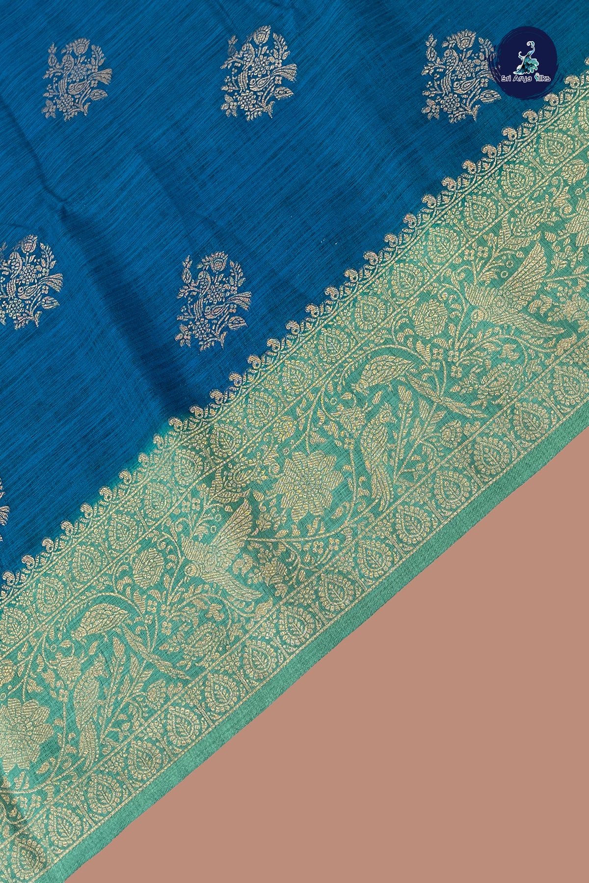 Teal Blue Semi Raw Silk Saree With Zari Buttas Pattern