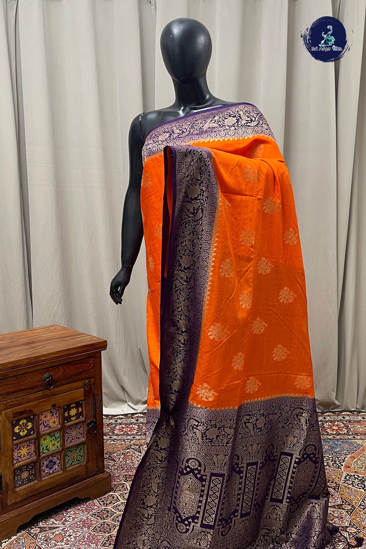 Orange Semi Raw Silk Saree With Zari Buttas Pattern