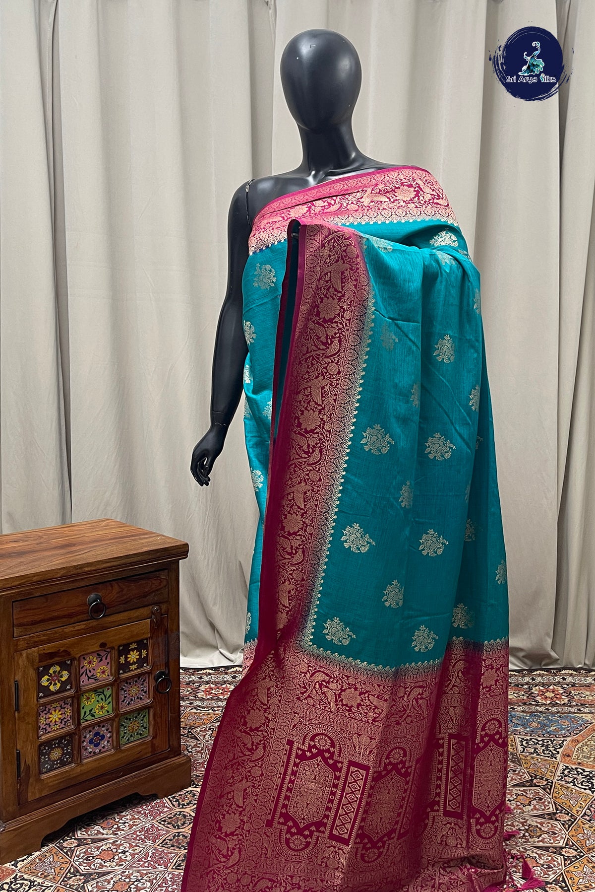 Teal Blue Semi Raw Silk Saree With Zari Buttas Pattern