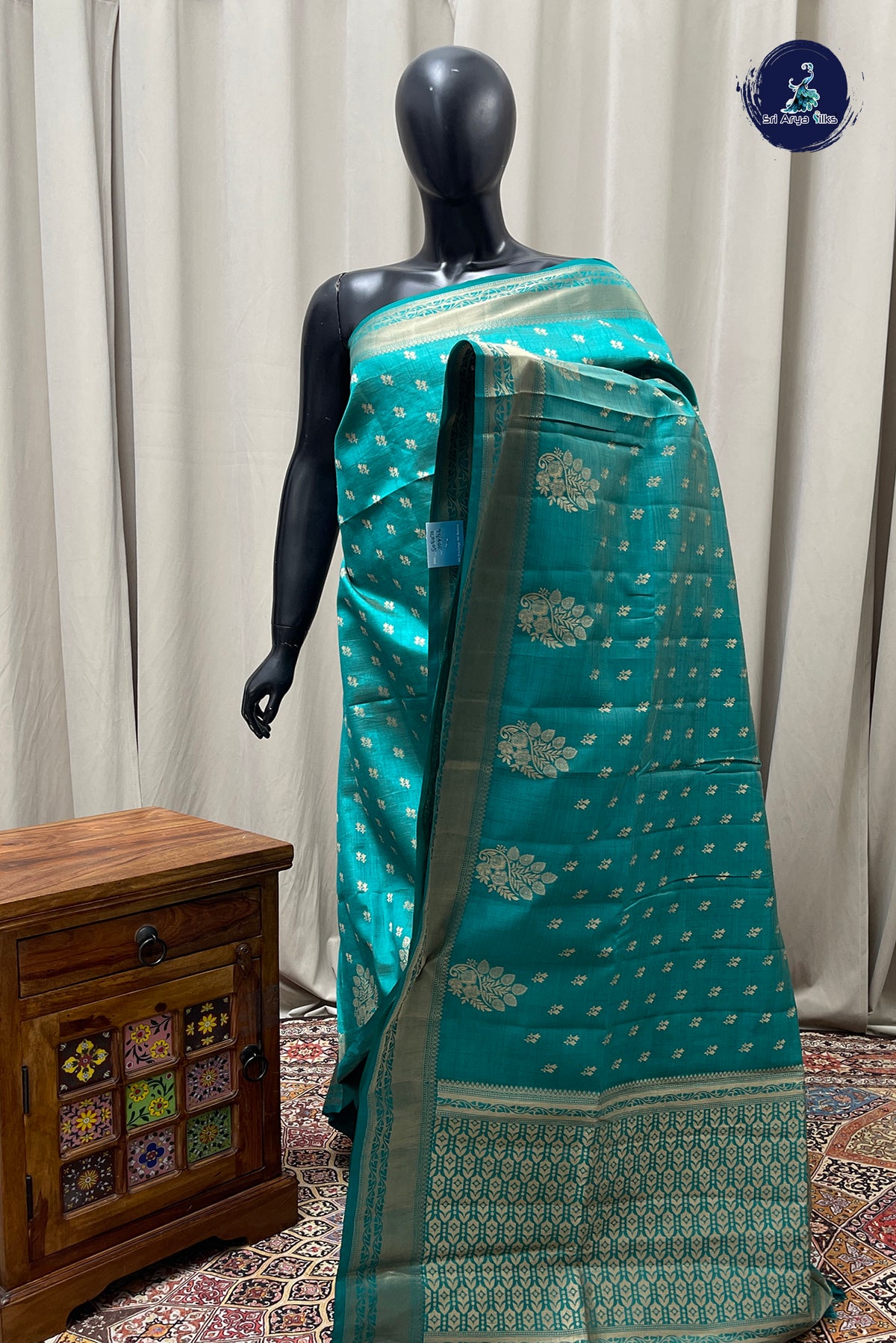 Teal Semi Tussar Saree With Zari Buttas Pattern