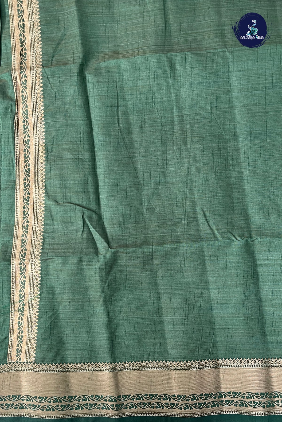 Dark Green Semi Tussar Saree With Zari Buttas Pattern
