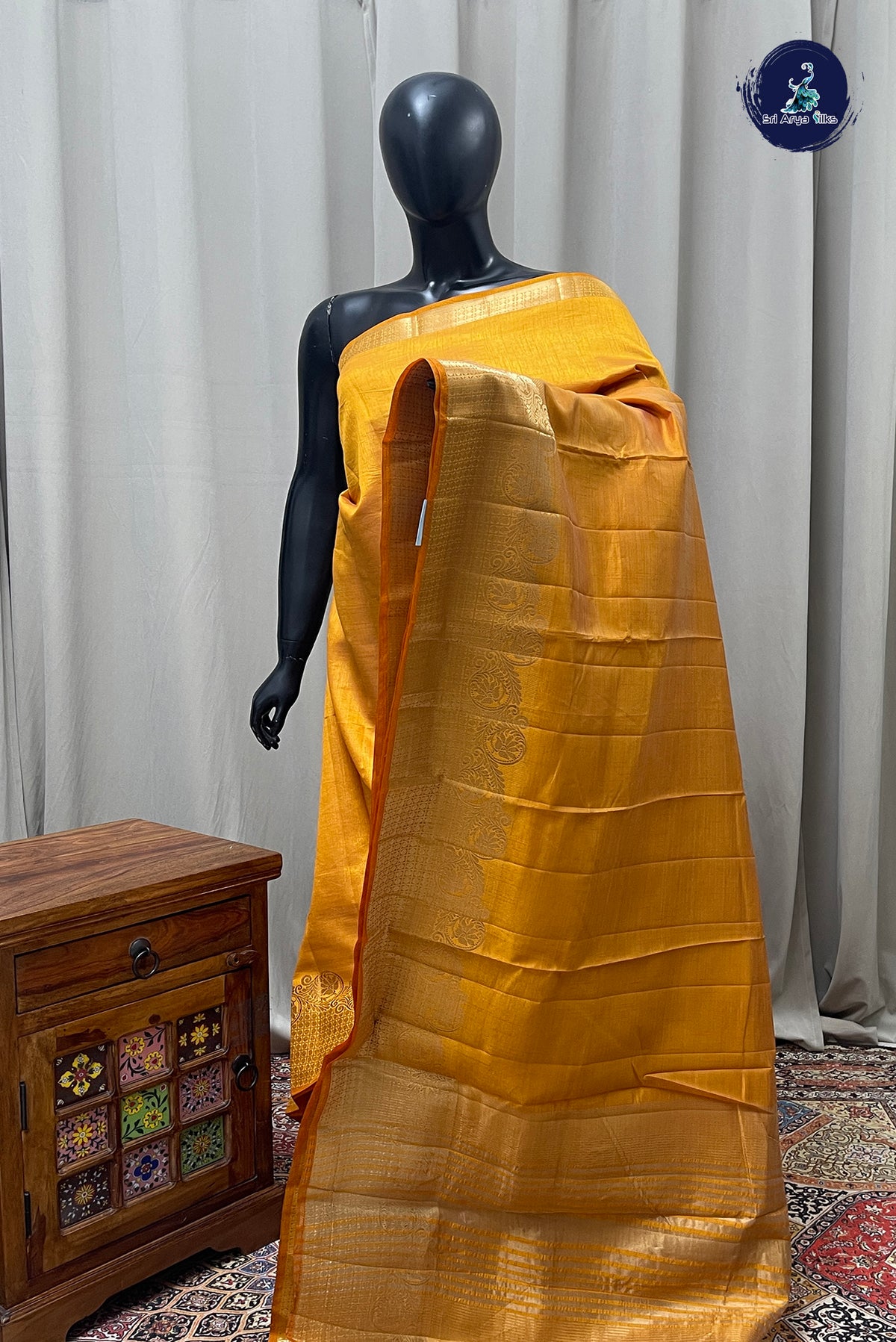 Lite Mustard Orange Semi Tussar Saree With Plain Pattern