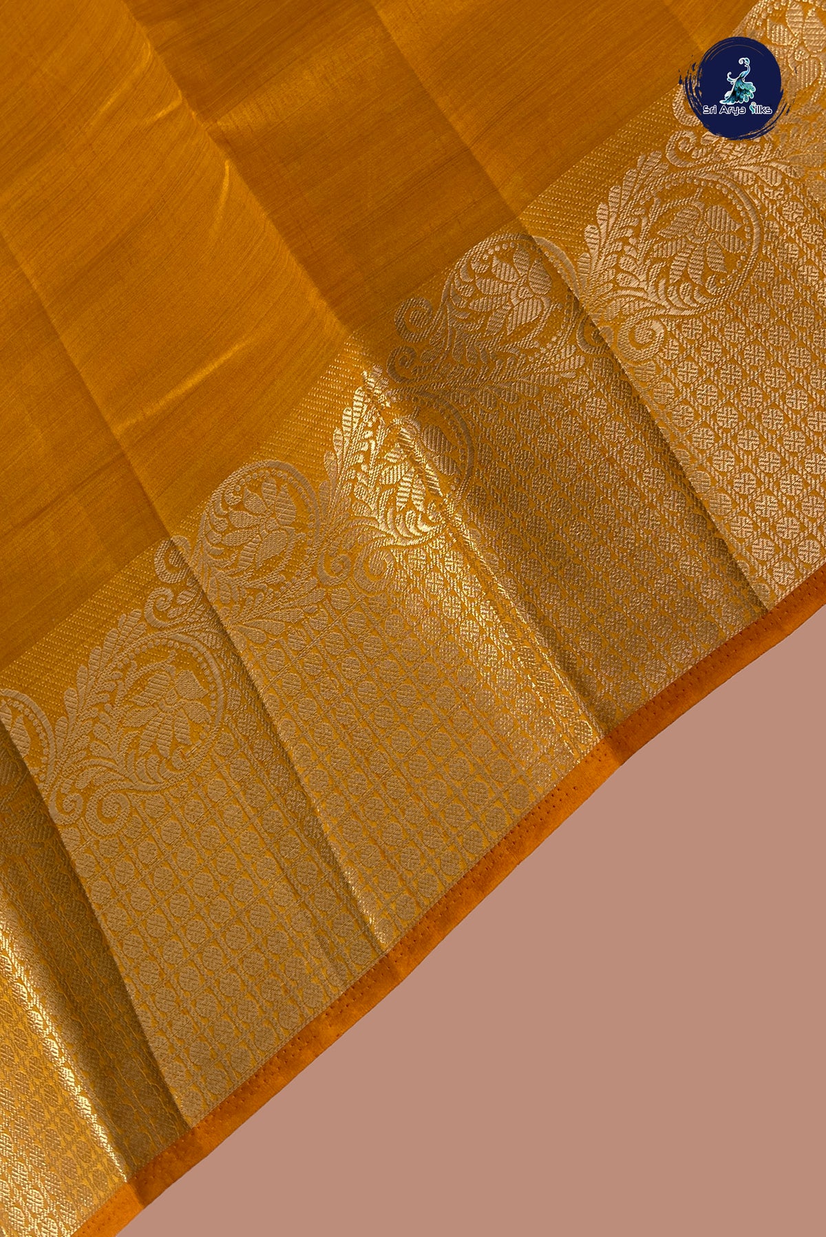 Lite Mustard Orange Semi Tussar Saree With Plain Pattern