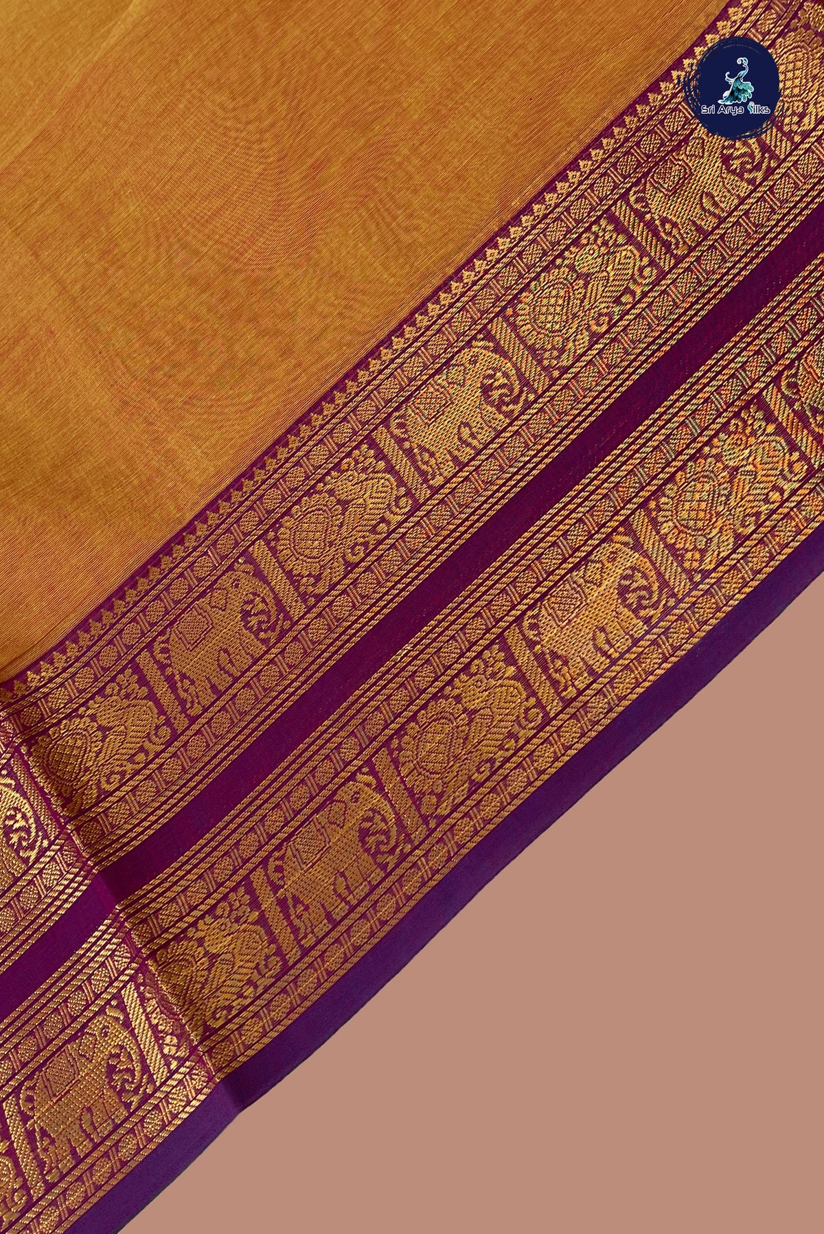 Lite Mustard Orange Kanchi Cotton Saree With Plain Pattern