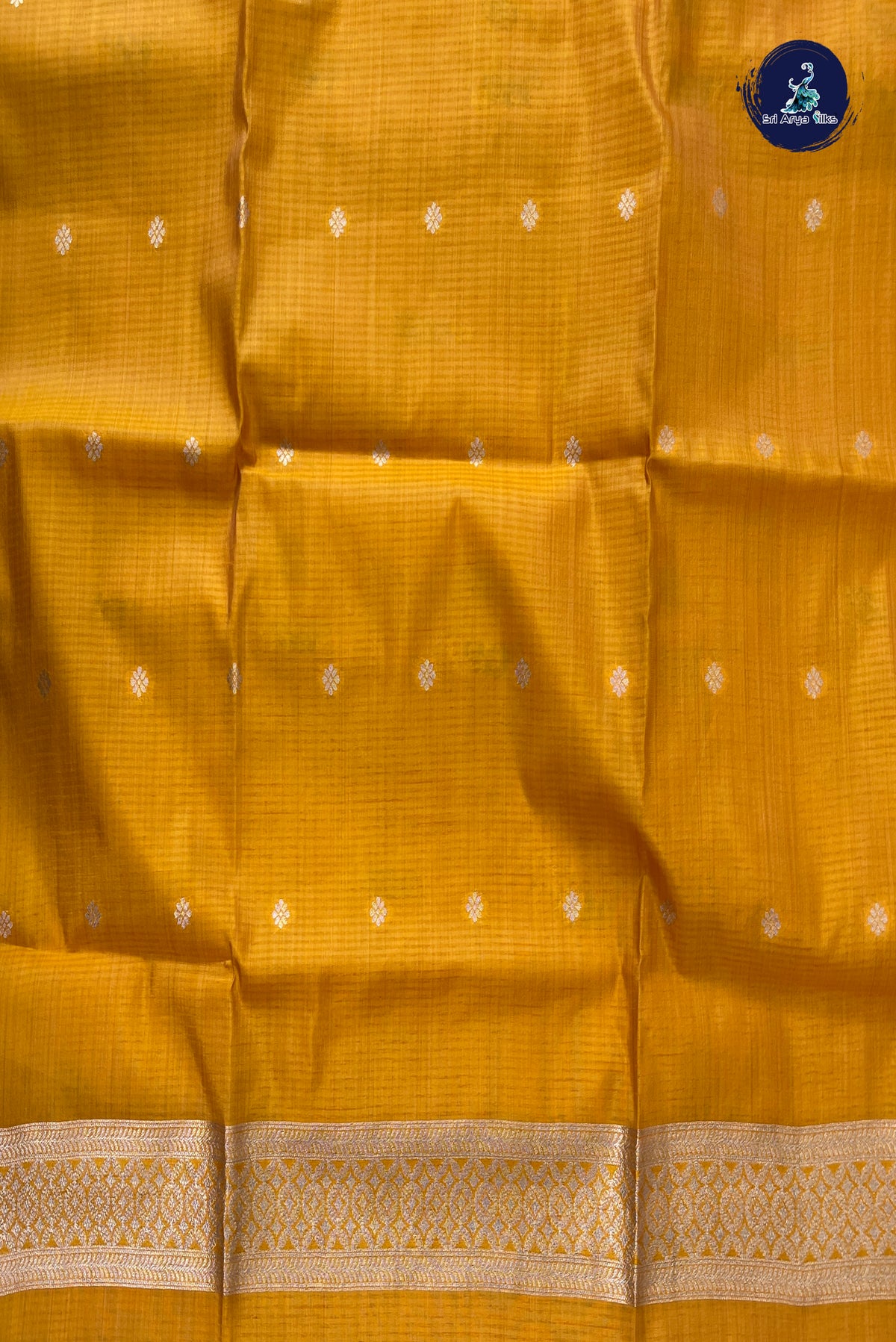 Lite Mustard Orange Semi Tussar Saree With Zari Buttas Pattern