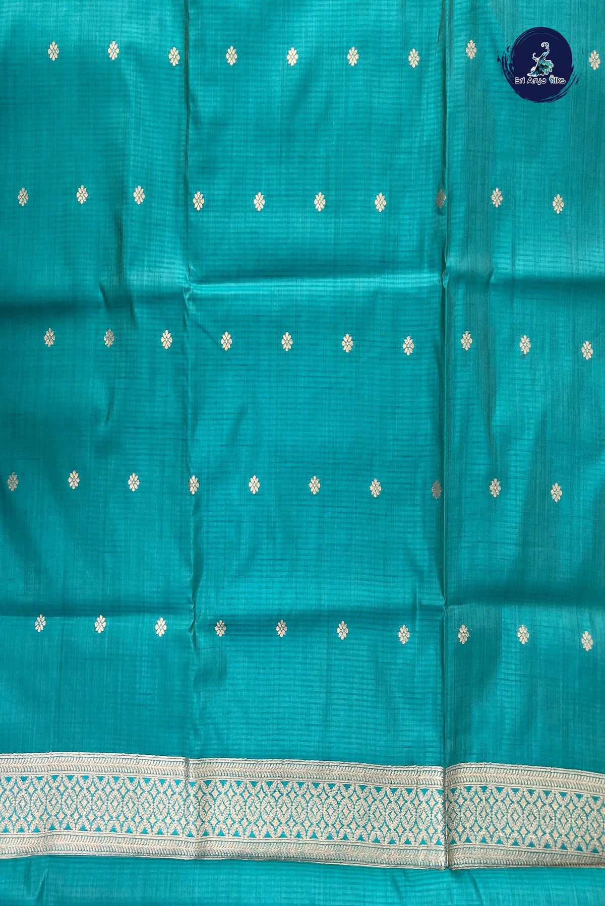 Turquoise Semi Tussar Saree With Zari Buttas Pattern