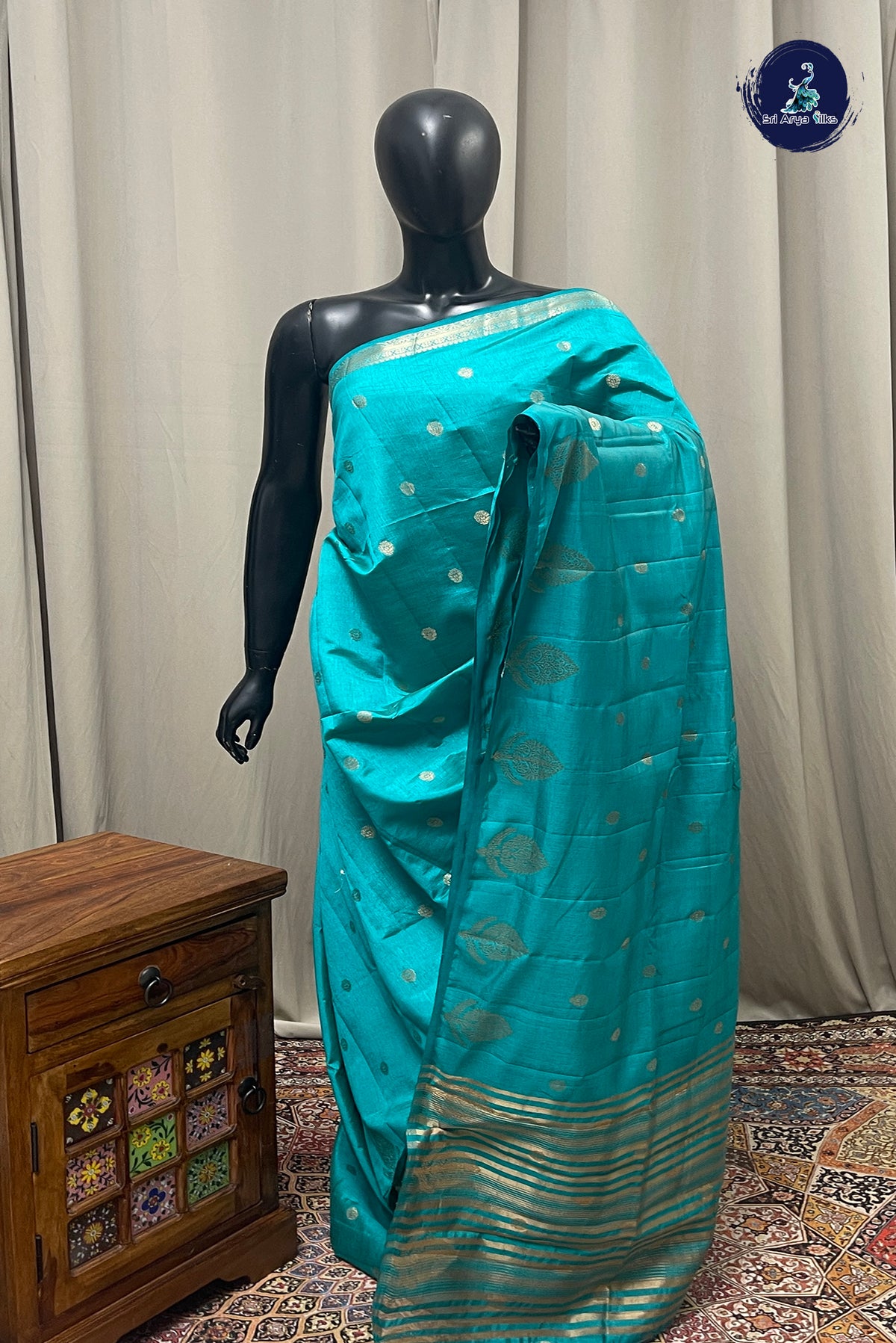 Turquoise Semi Tussar Saree With Zari Buttas Pattern